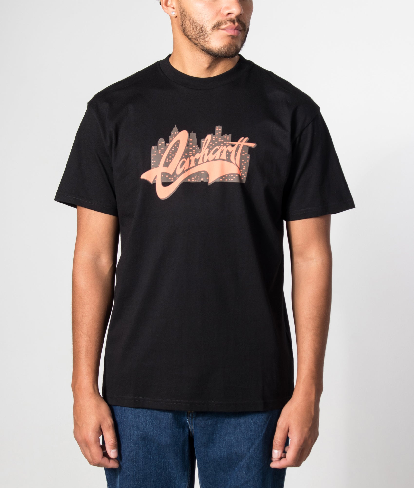 Carhartt WIP Loose Fit Boogie Night T-Shirt in Black at EQVVS Menswear. Model front shot.