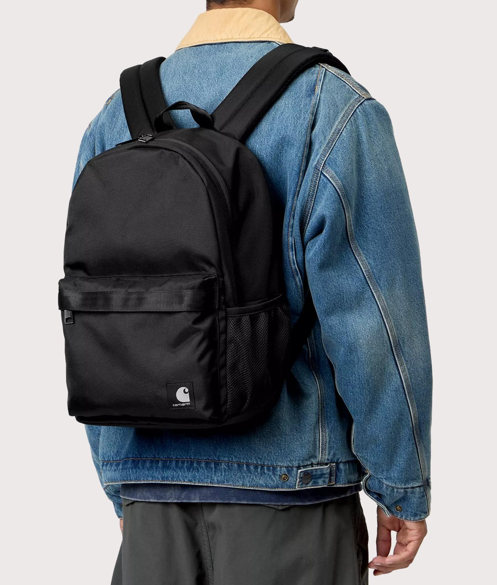 Carhartt WIP Richmond Backpack in Black at EQVVS Menswear. Model shot.