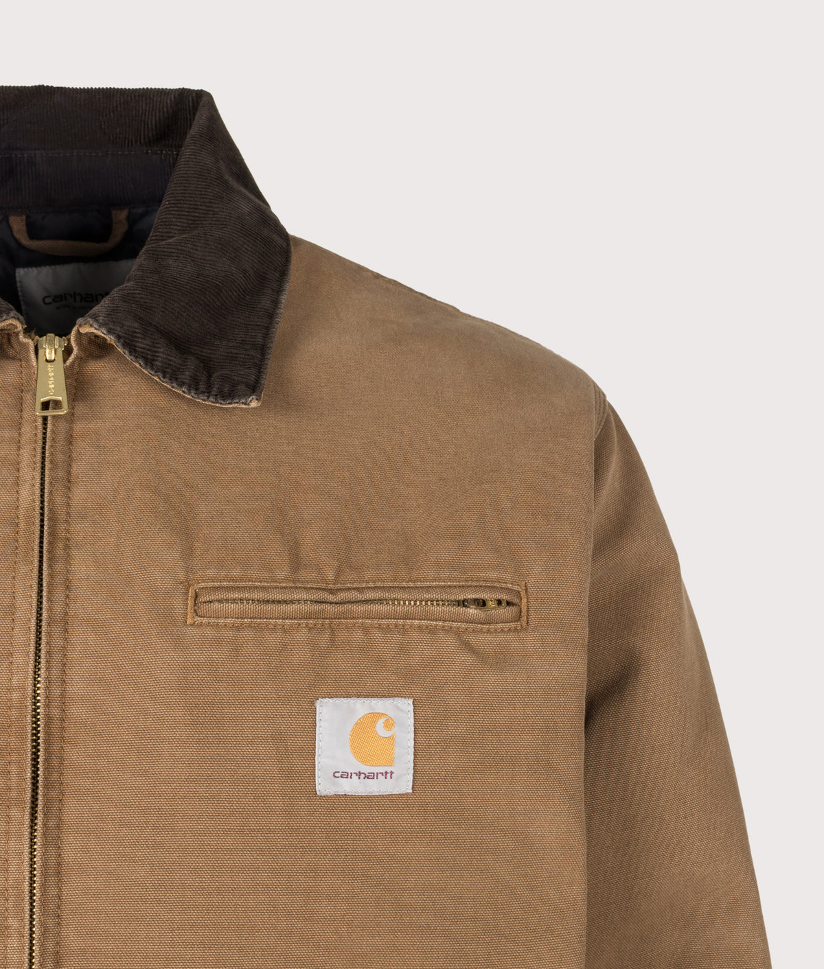 Carhartt WIP Loose Fit OG Detroit Jacket in WIP H Brown and Tobacco at EQVVS Menswear. Detail shot.