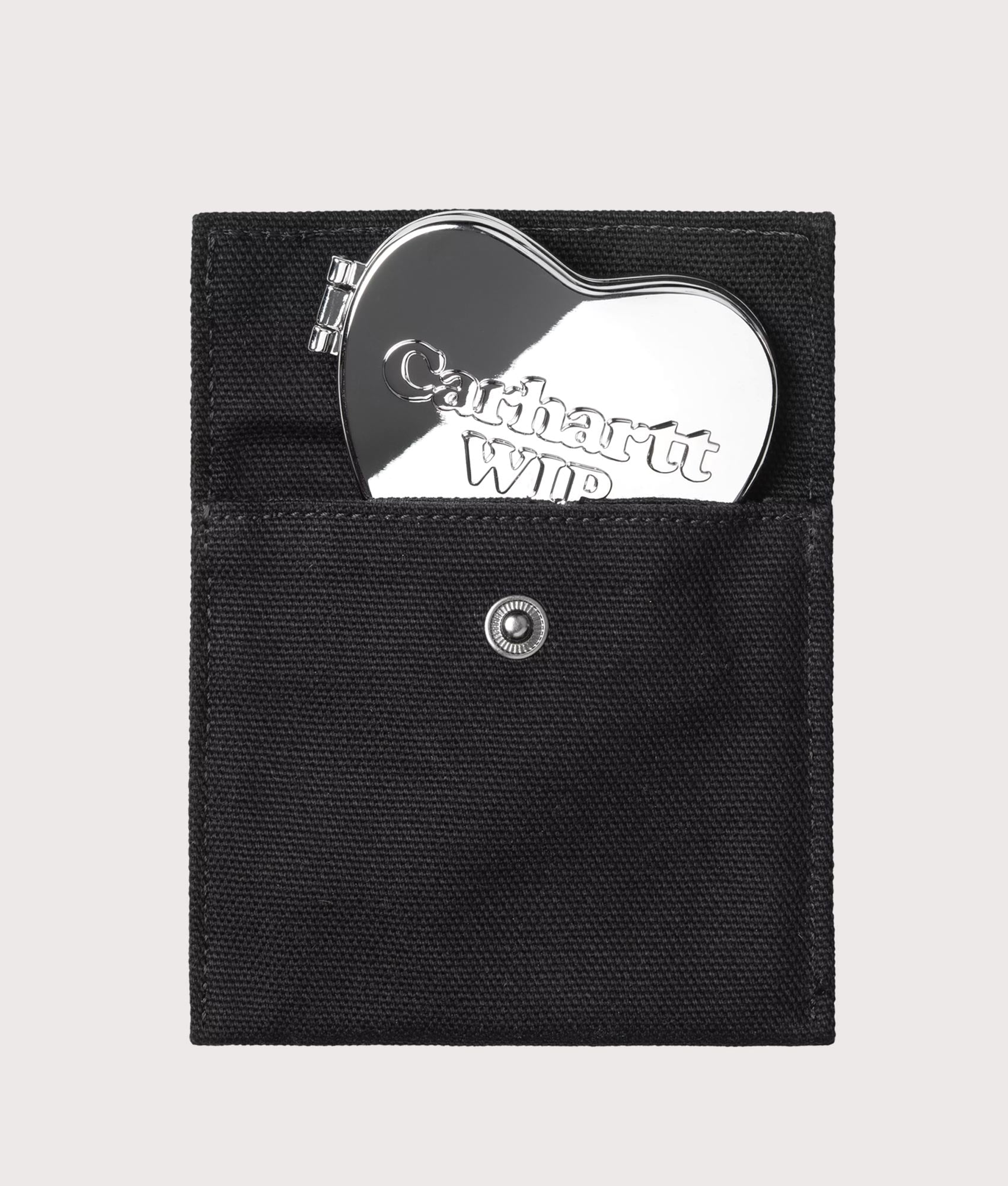 Carhartt WIP Heart Pocket Mirror in Silver at EQVVS Menswear. Case shot.