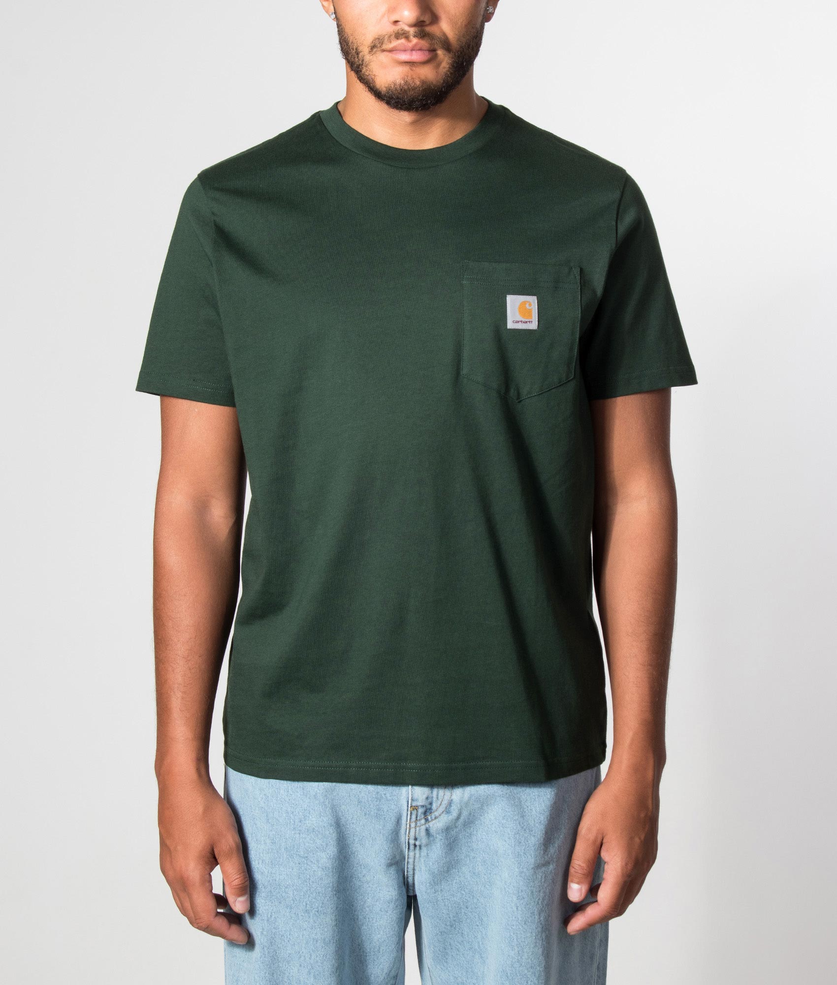 Carhartt WIP Regular Fit Pocket T-Shirt in Dark Scarab at EQVVS Menswear. Model front shot.