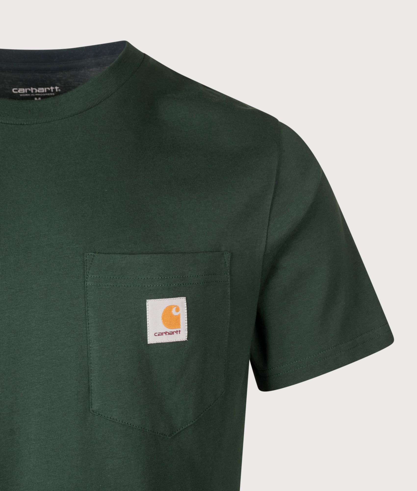 Carhartt WIP Regular Fit Pocket T-Shirt in Dark Scarab at EQVVS Menswear. Detail shot.