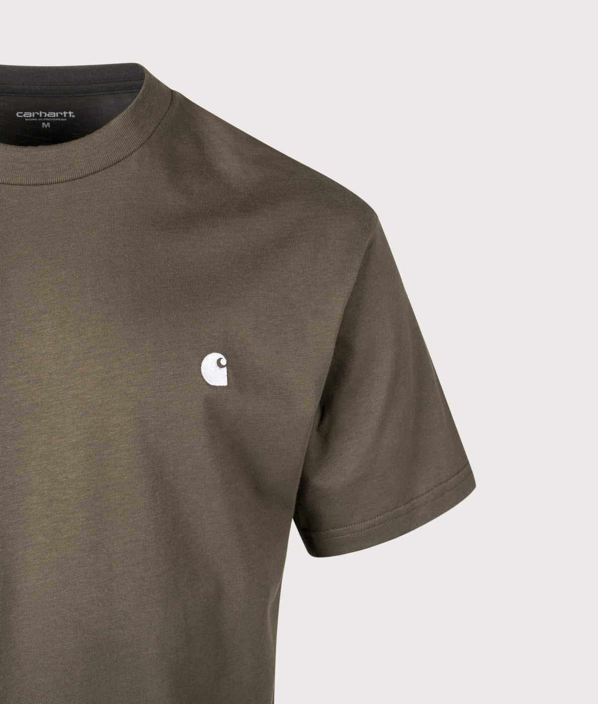 Carhartt WIP Loose Fit Madison T-Shirt in Cypress and White at EQVVS Menswear. Detail shot.