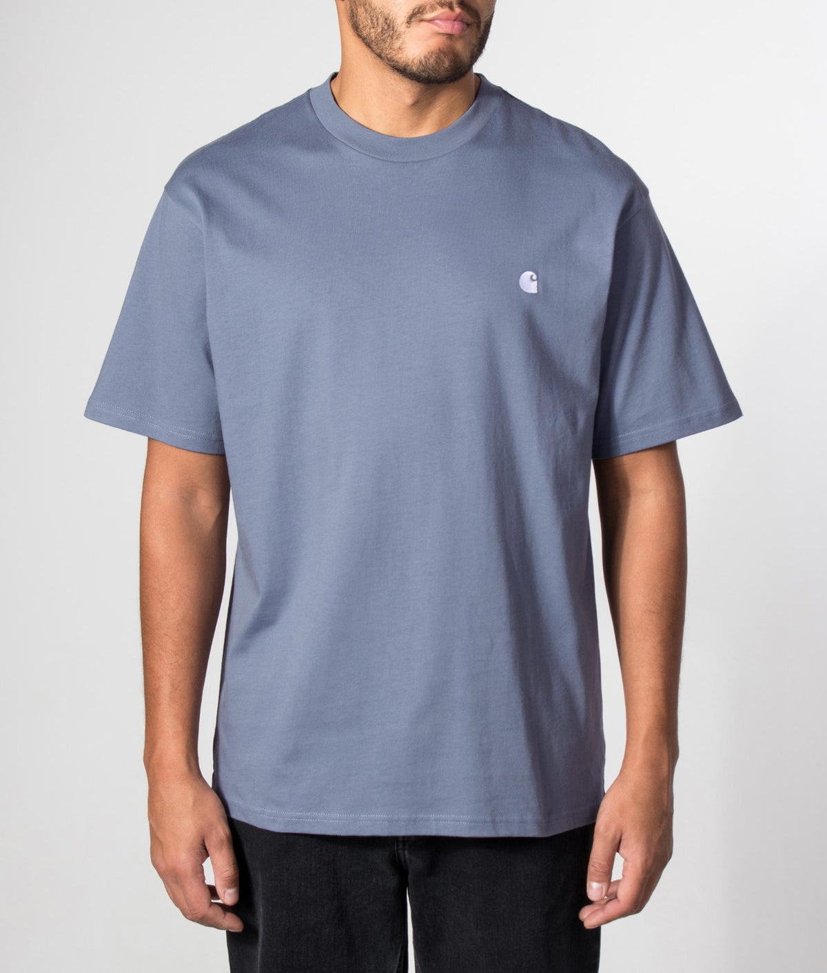 Carhartt WIP Loose Fit Madison T-Shirt in Shady Blue and White at EQVVS Menswear. Model front shot.