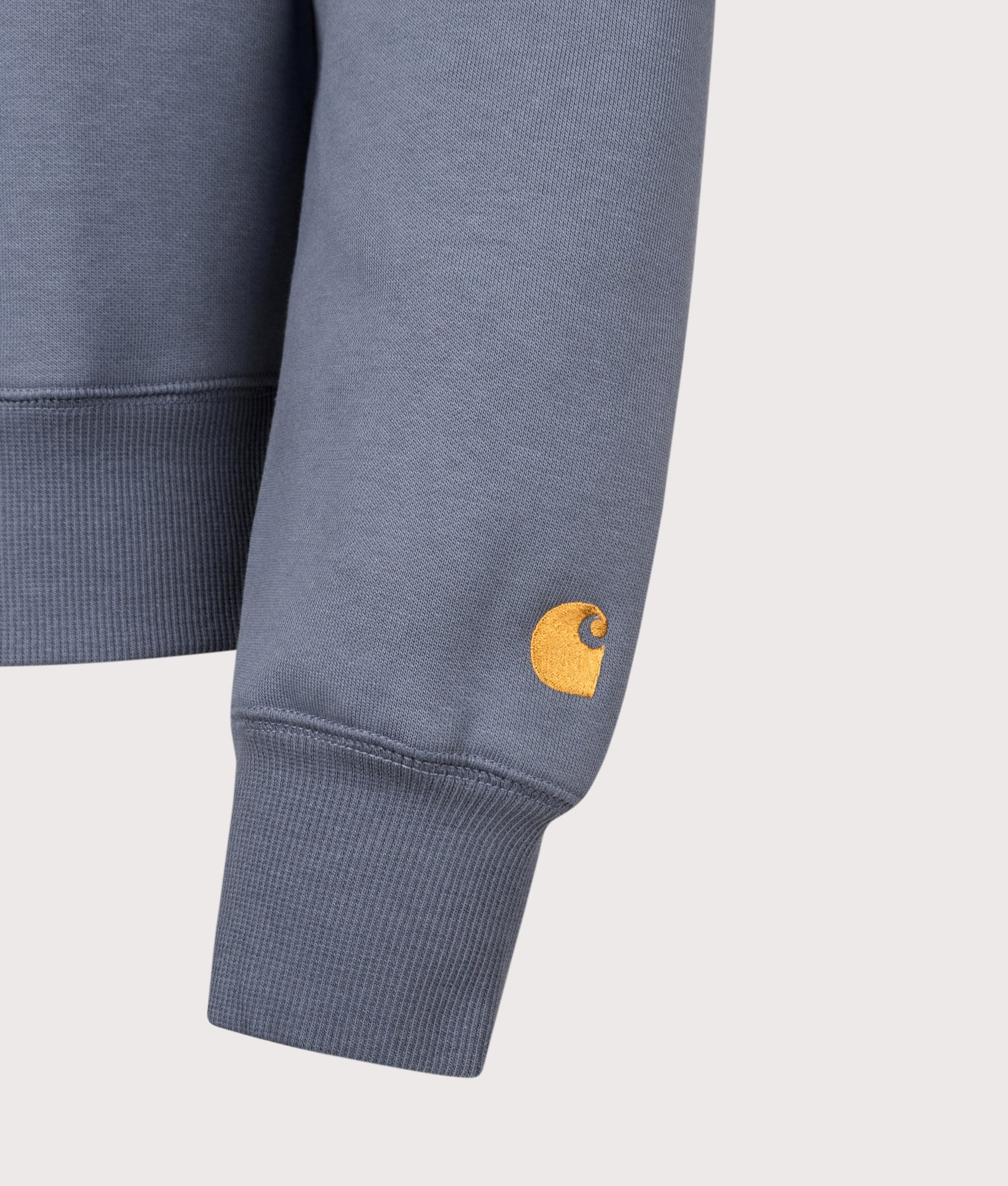 Carhartt WIP Regular Fit Chase Sweatshirt in Icesheet and Gold at EQVVS Menswear. Detail shot.