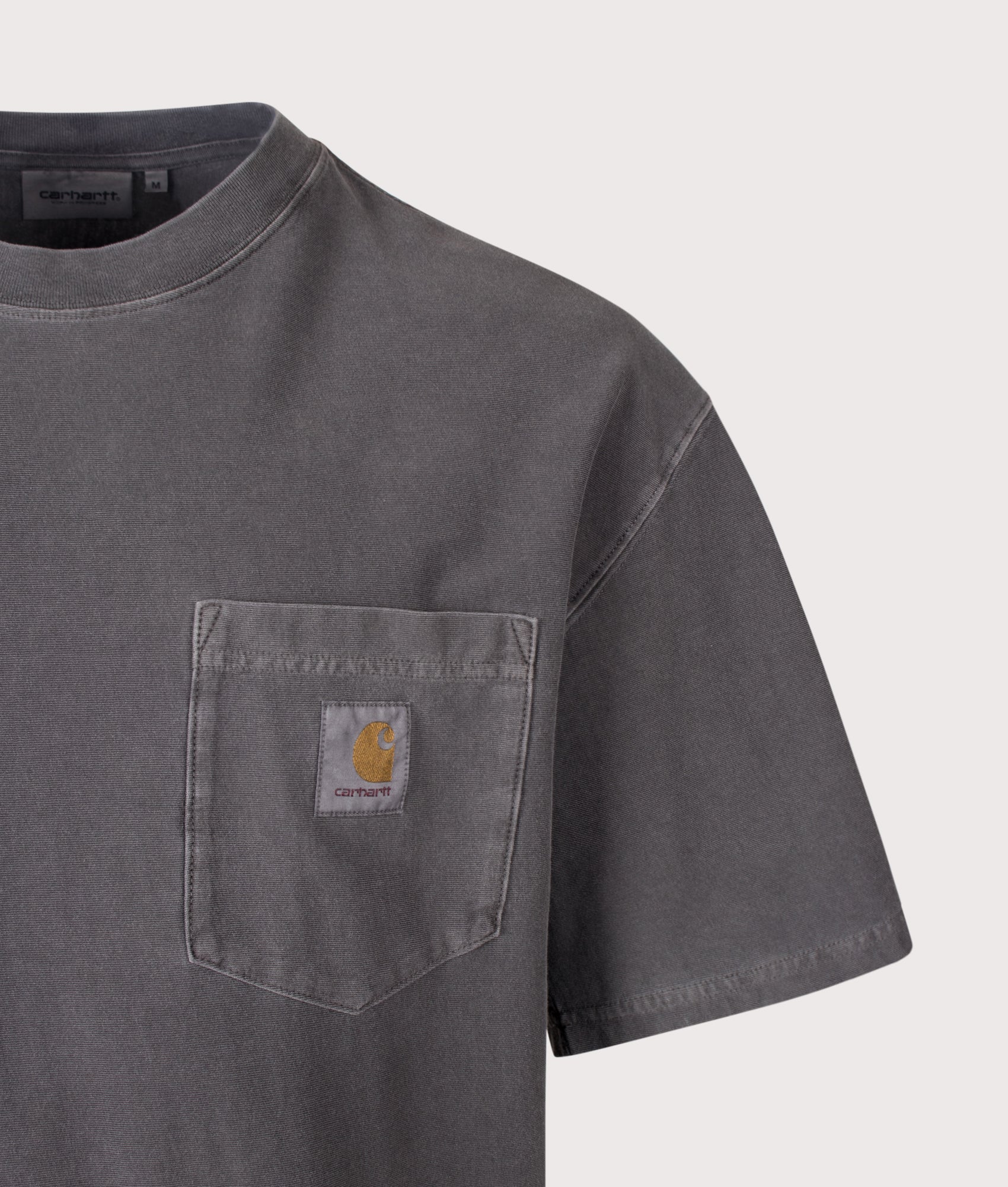 Carhartt WIP Oversized Fit Pocket T-Shirt in Black at EQVVS Menswear. Detail shot.