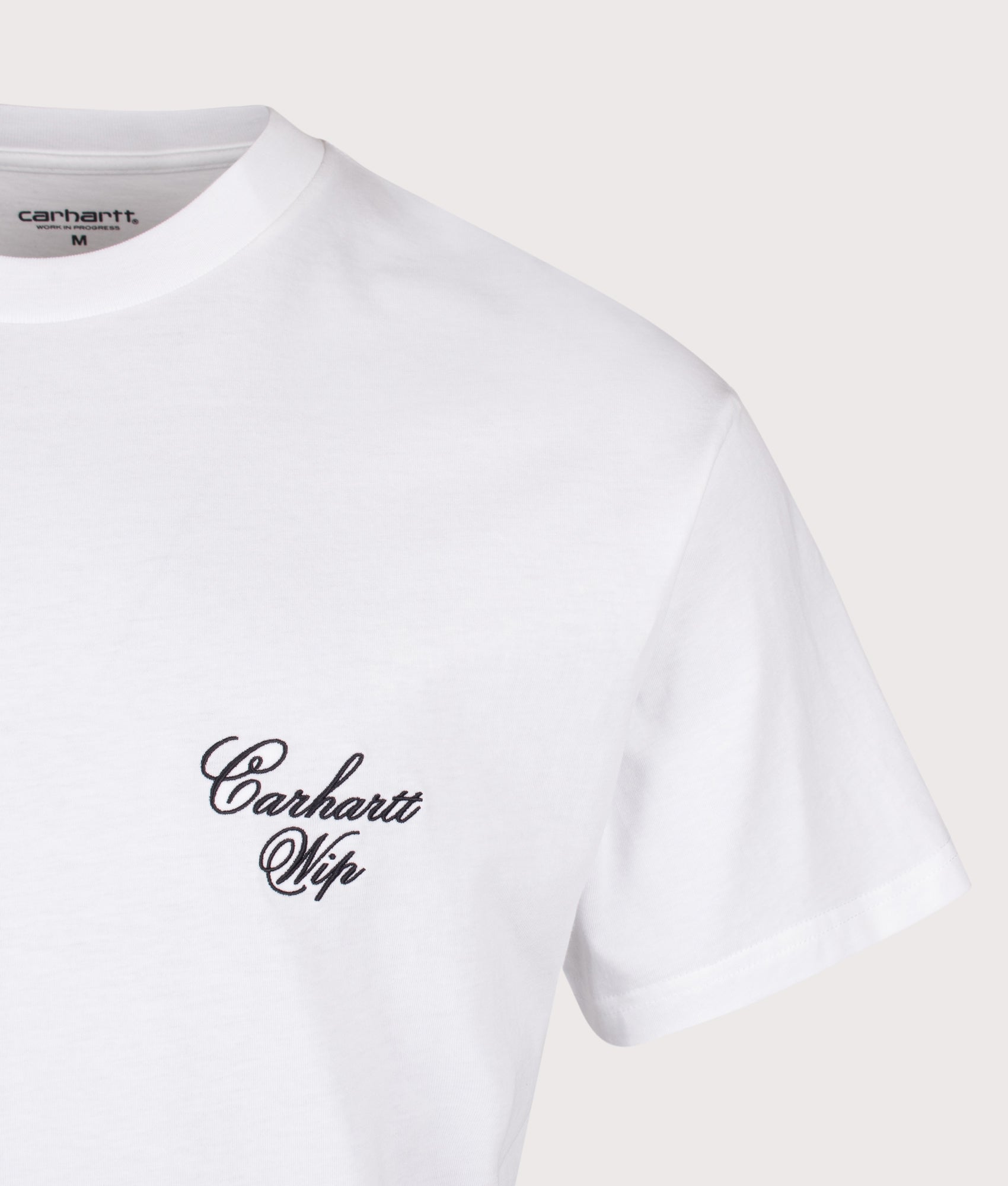 Carhartt WIP Loose Fit Gracious T-Shirt in White at EQVVS Menswear. Detail shot.