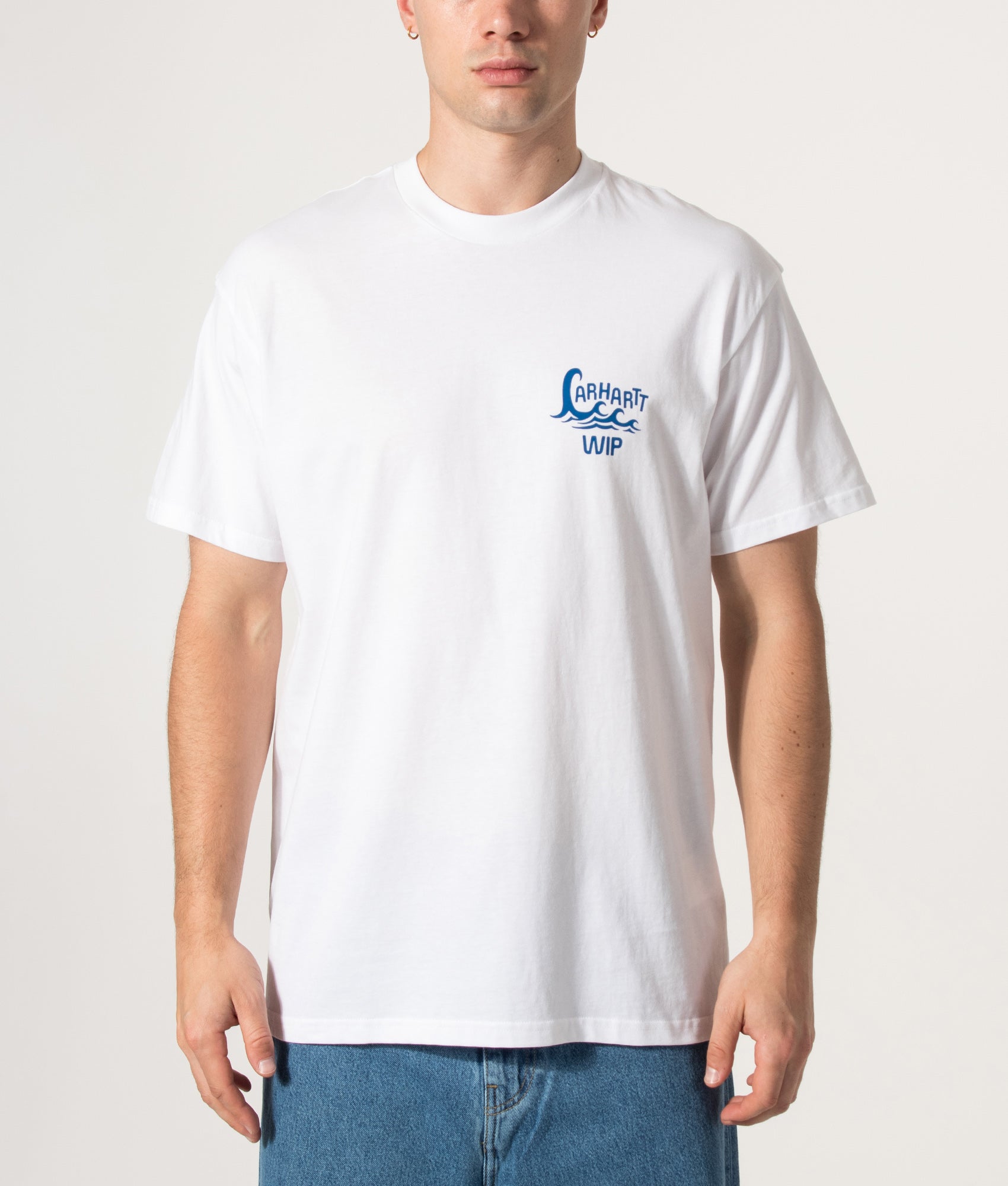 Carhartt WIP Loose Fit Waves T-Shirt in White at EQVVS Menswear. Model front shot.
