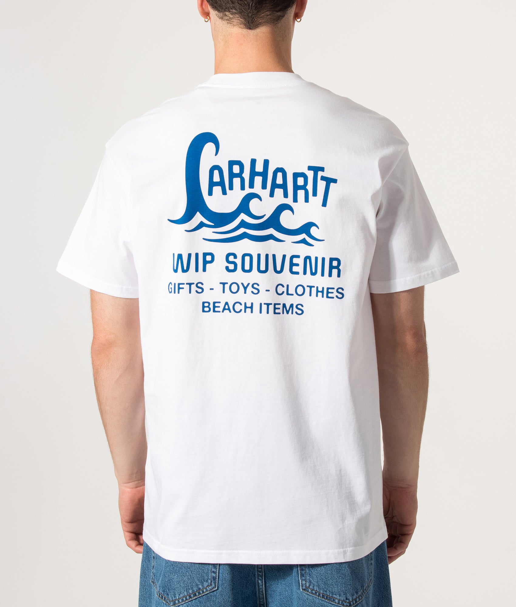 Carhartt WIP Loose Fit Waves T-Shirt in White at EQVVS Menswear. Model back shot.