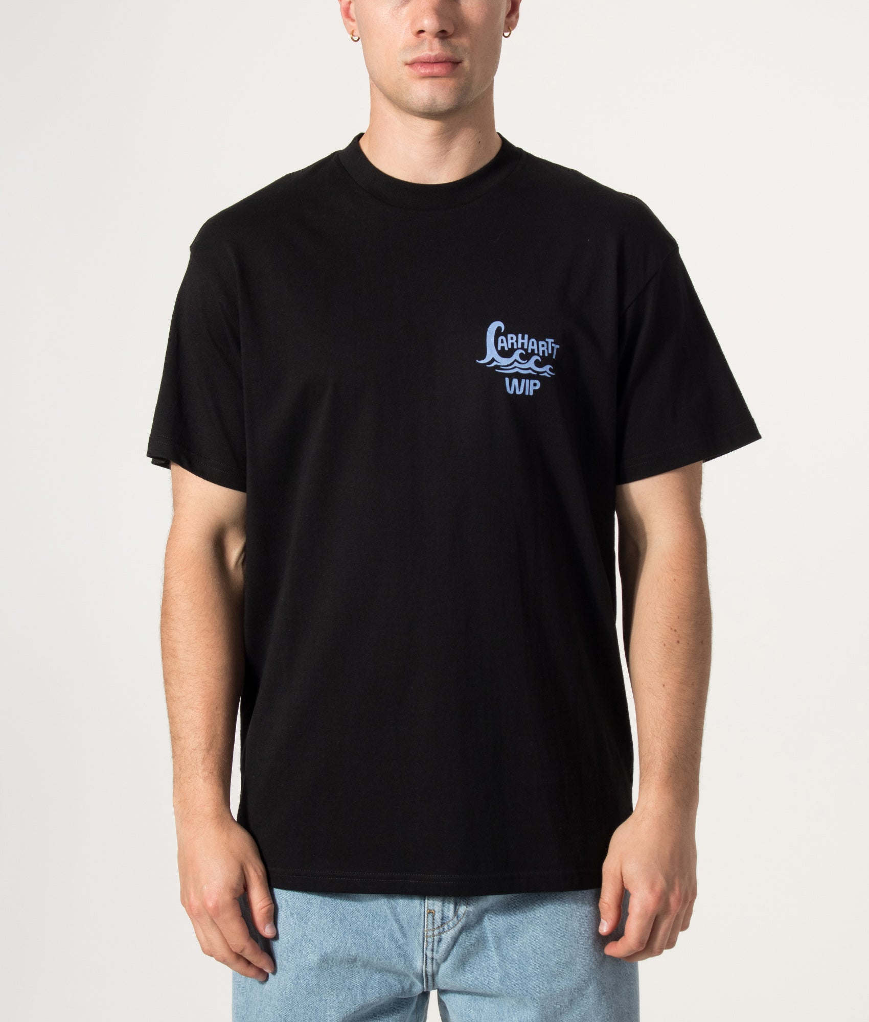 Carhartt WIP Loose Fit Waves T-Shirt in Black at EQVVS Menswear. Model front shot.