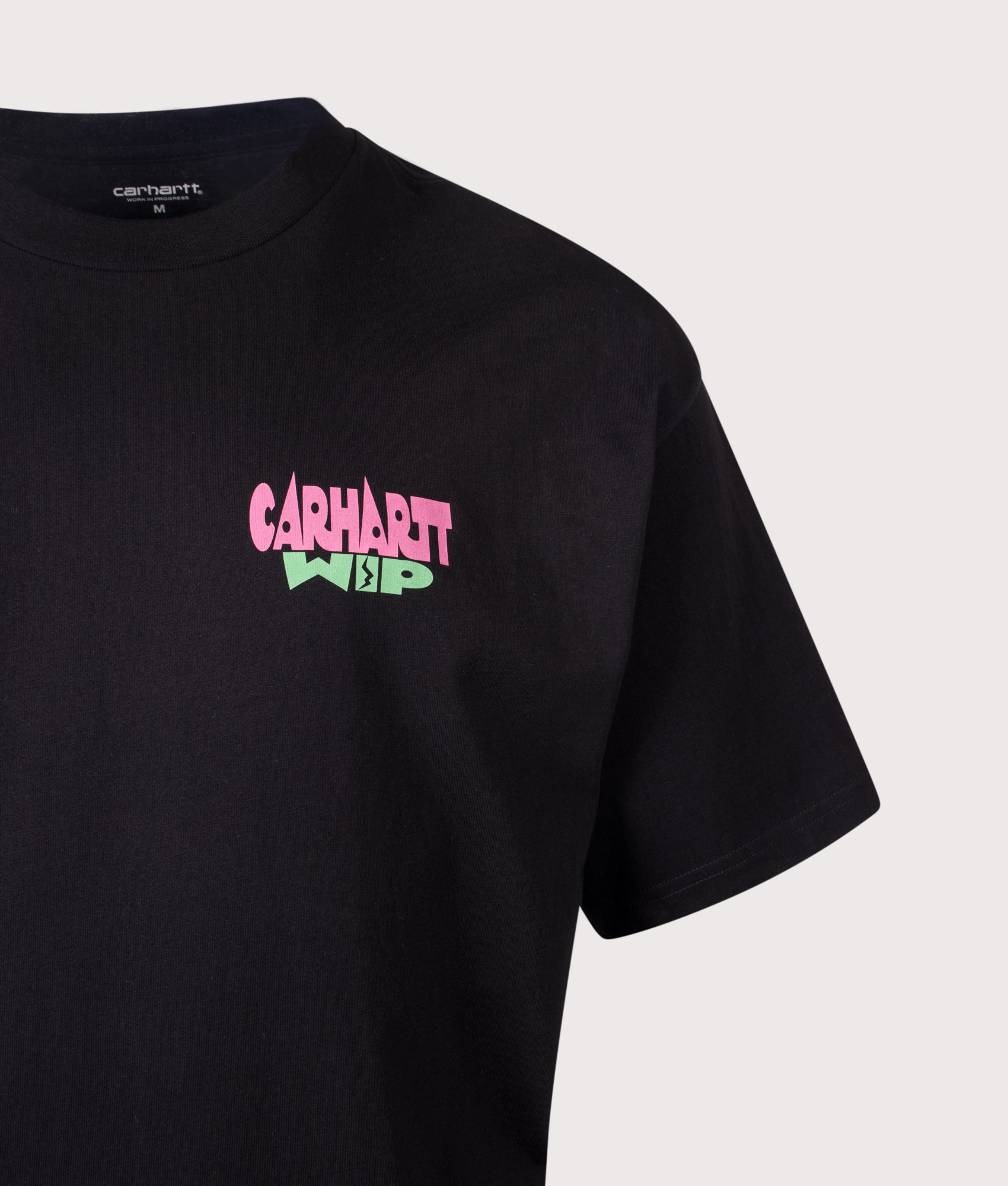 Carhartt WIP Oversized Fit Luggage Label T-Shirt in Black at EQVVS Menswear. Detail shot.
