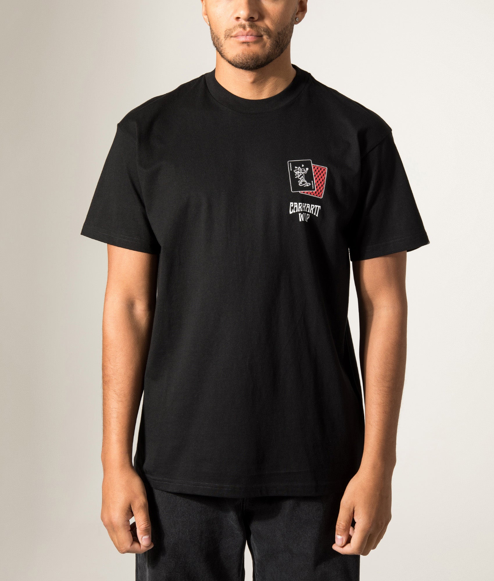 Carhartt WIP Loose Fit Playing Cards T-Shirt in Black at EQVVS Menswear. Model front shot.