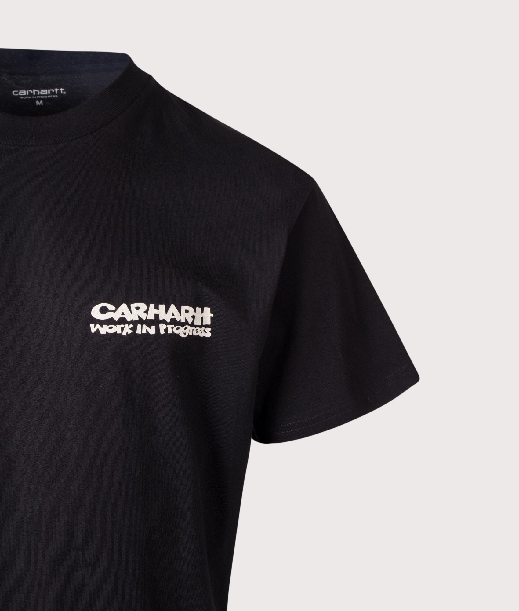 Carhartt WIP Loose Fit Cubist T-Shirt in Black at EQVVS Menswear. Detail shot.