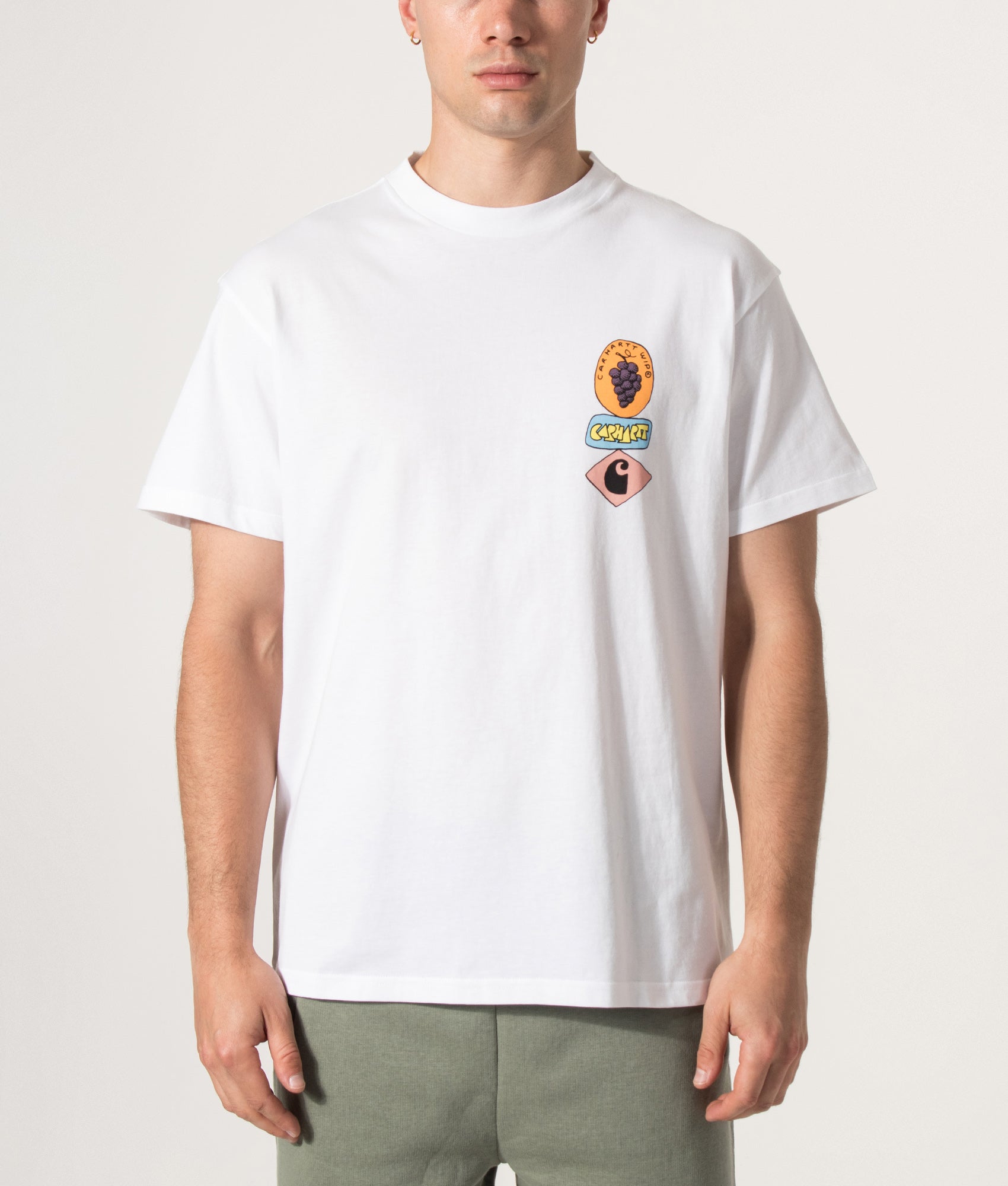 Carhartt WIP Loose Fit Stacked Grapes T-Shirt in White at EQVVS Menswear. Model front shot.