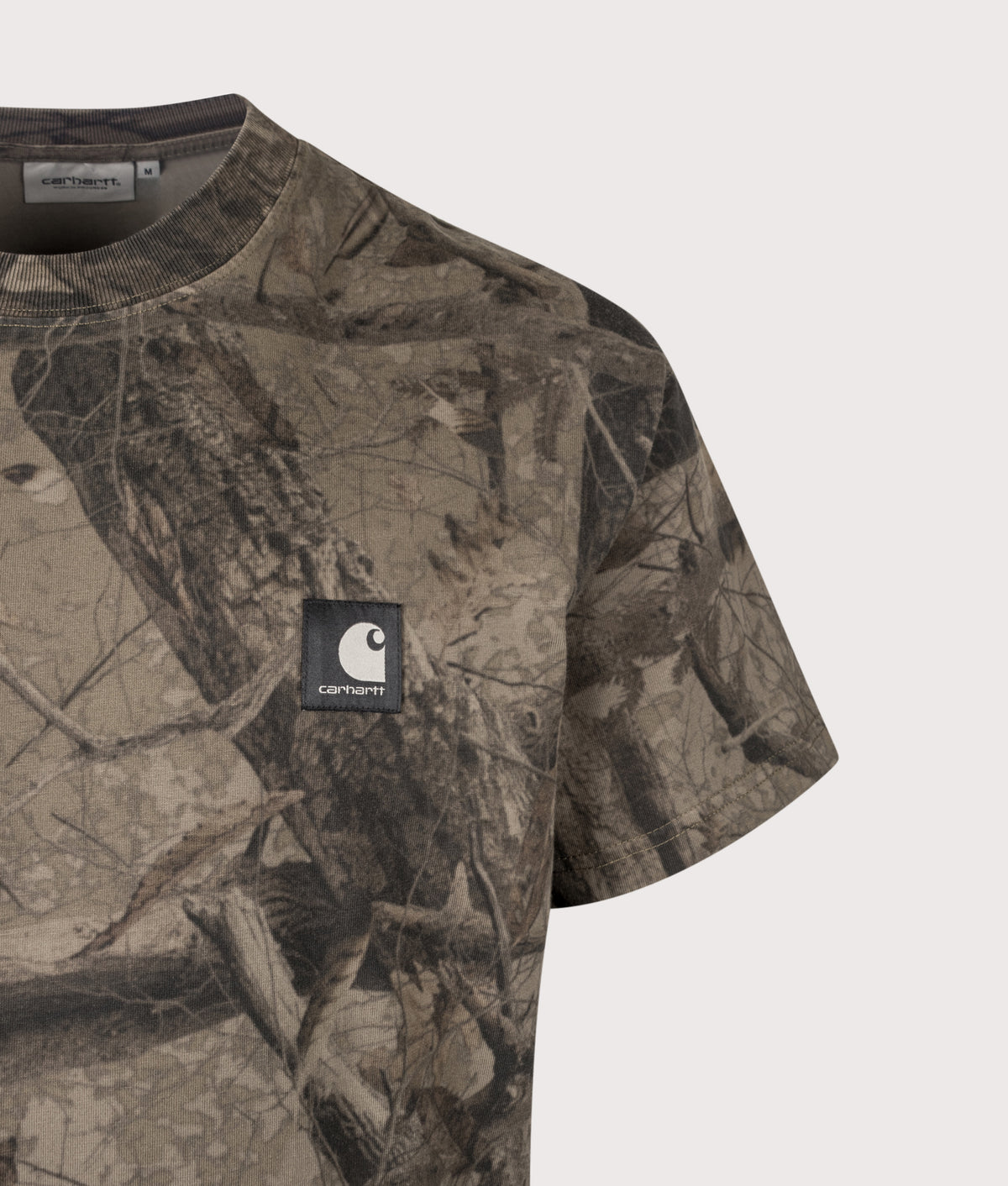 Carhartt WIP Loose Fit Feather Tree T-Shirt in Khaki, Shungite and Camo Feather Tree at EQVVS Menswear. Detail shot.
