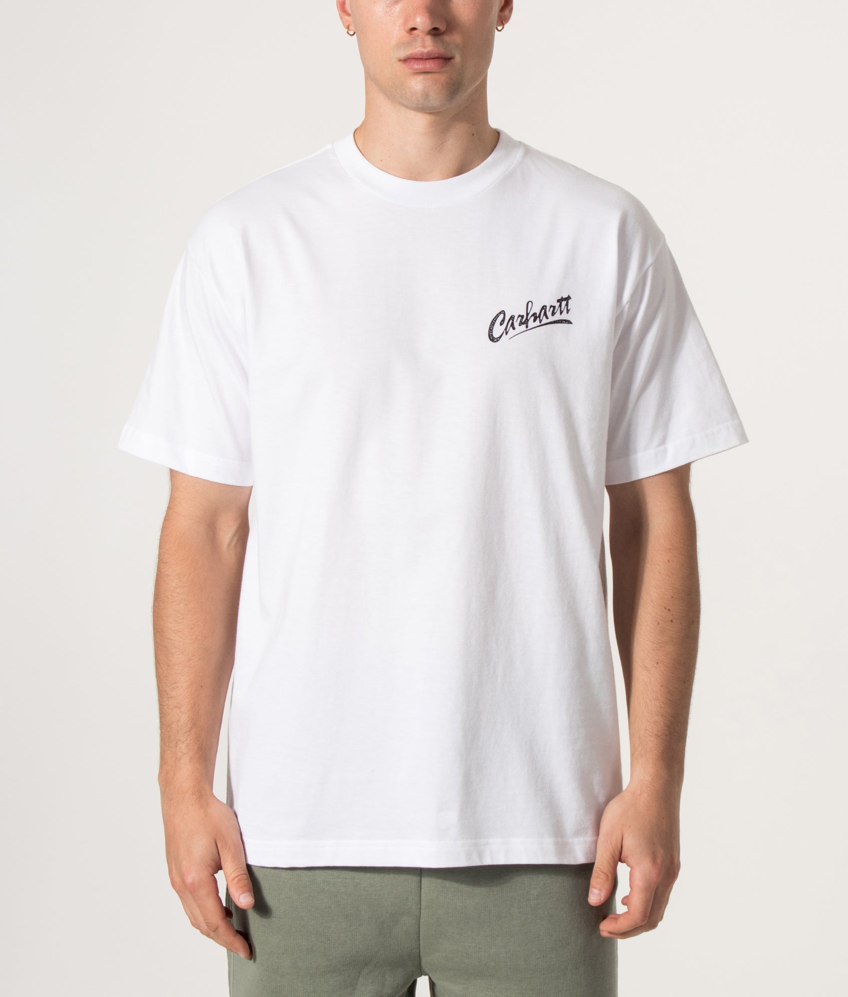 Carhartt WIP Loose Fit Pup T-Shirt in White at EQVVS Menswear. Model front shot.