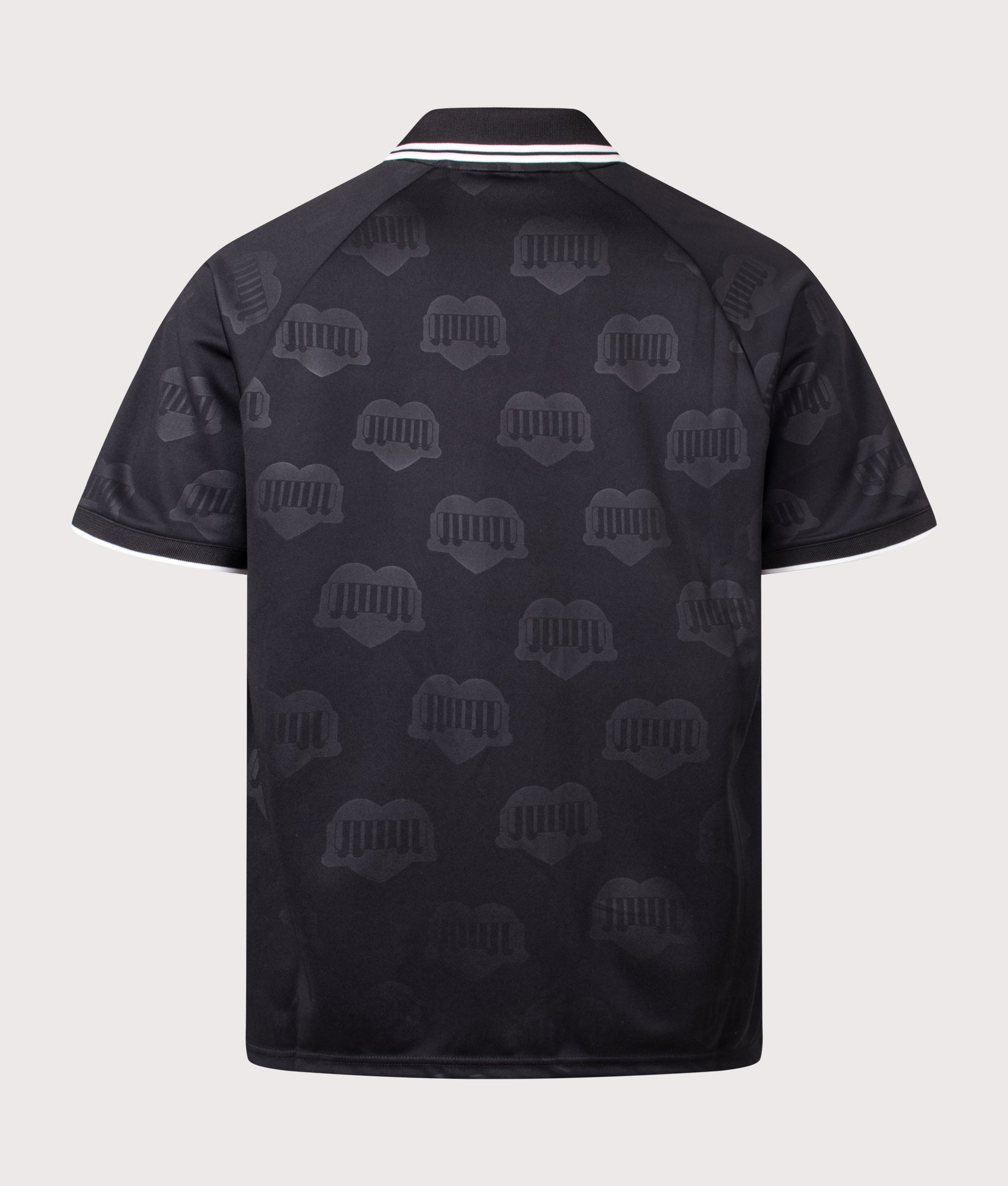 Carhartt WIP Loose Fit Terrace Football T-Shirt in Heart Train Jacquard and Black at EQVVS Menswear. Back shot.