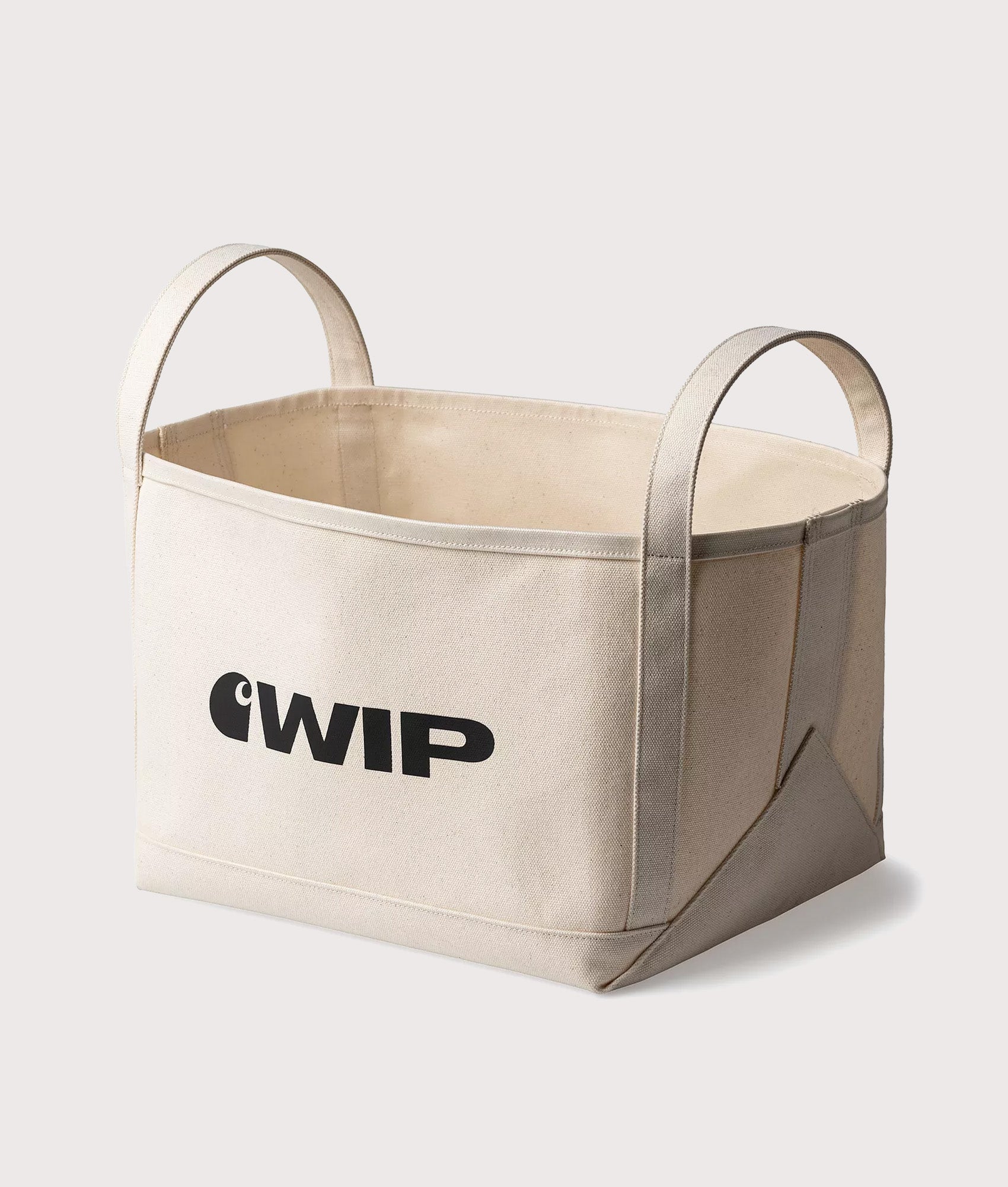 Carhartt WIP WIP Magazine Canvas Basket in Natural at EQVVS Menswear. Angled front shot.