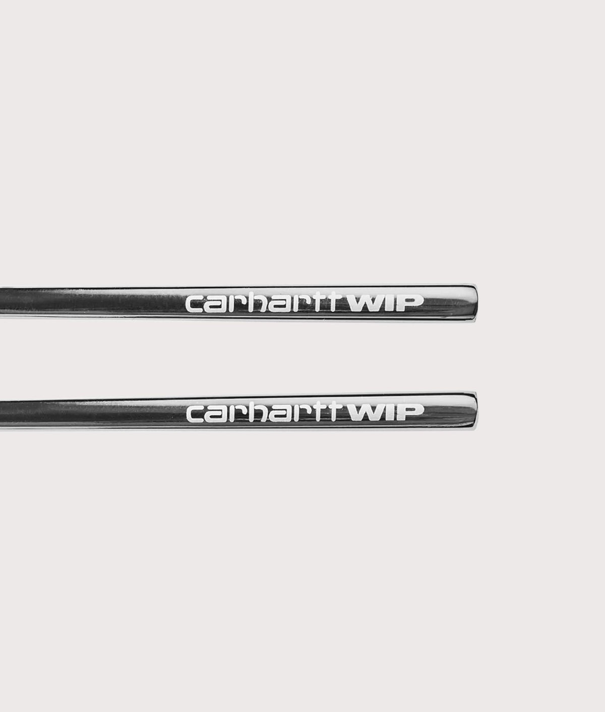 Carhartt WIP WIP Chopsticks in Silver at EQVVS Menswear. Detail shot.