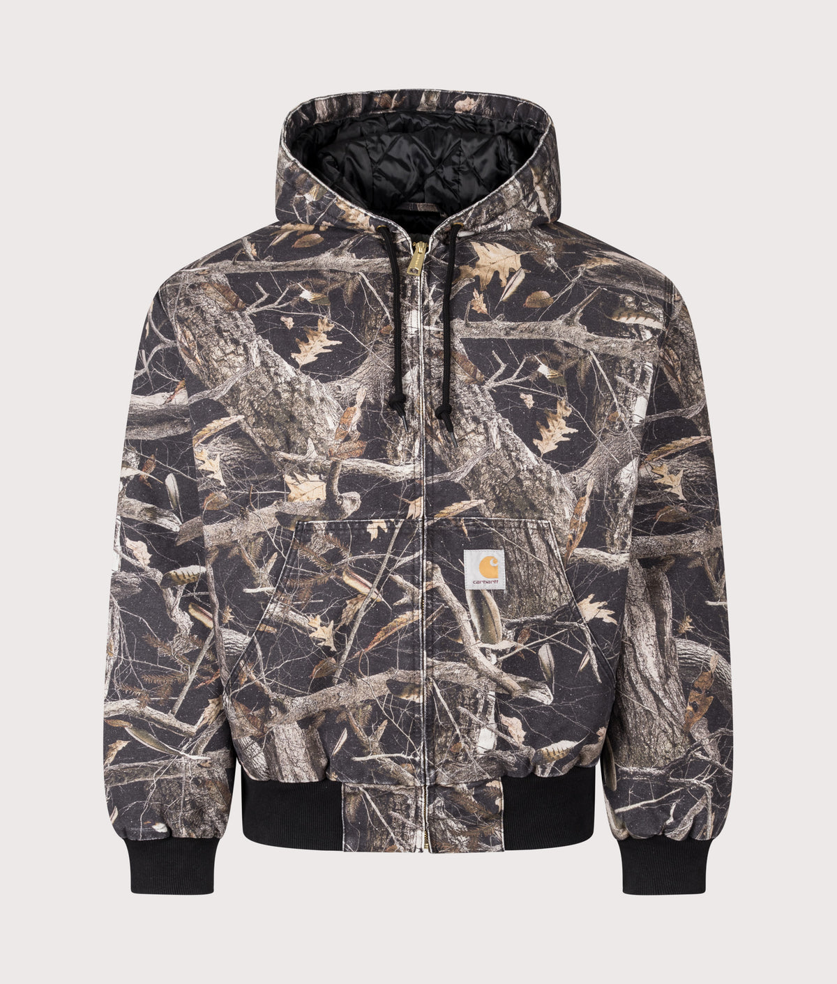Carhartt WIP Loose Fit OG Active Jacket  in Heavy stone wash Camo Feather Tree/Black at EQVVS Menswear. Front shot.