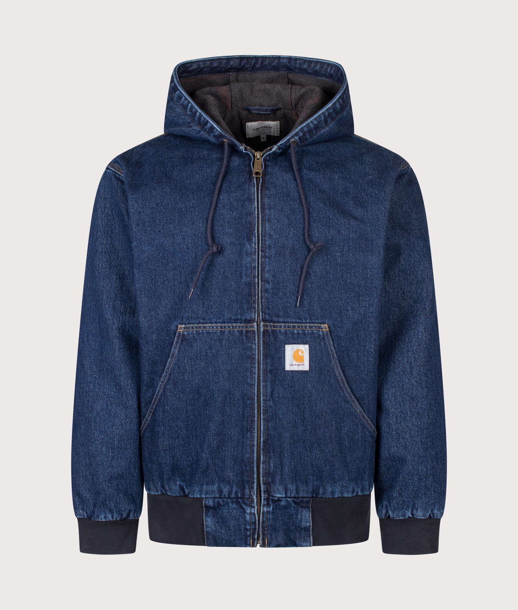 Carhartt WIP Loose Fit OG Active Jacket in Blue Stone Washed at EQVVS Menswear. Front shot.