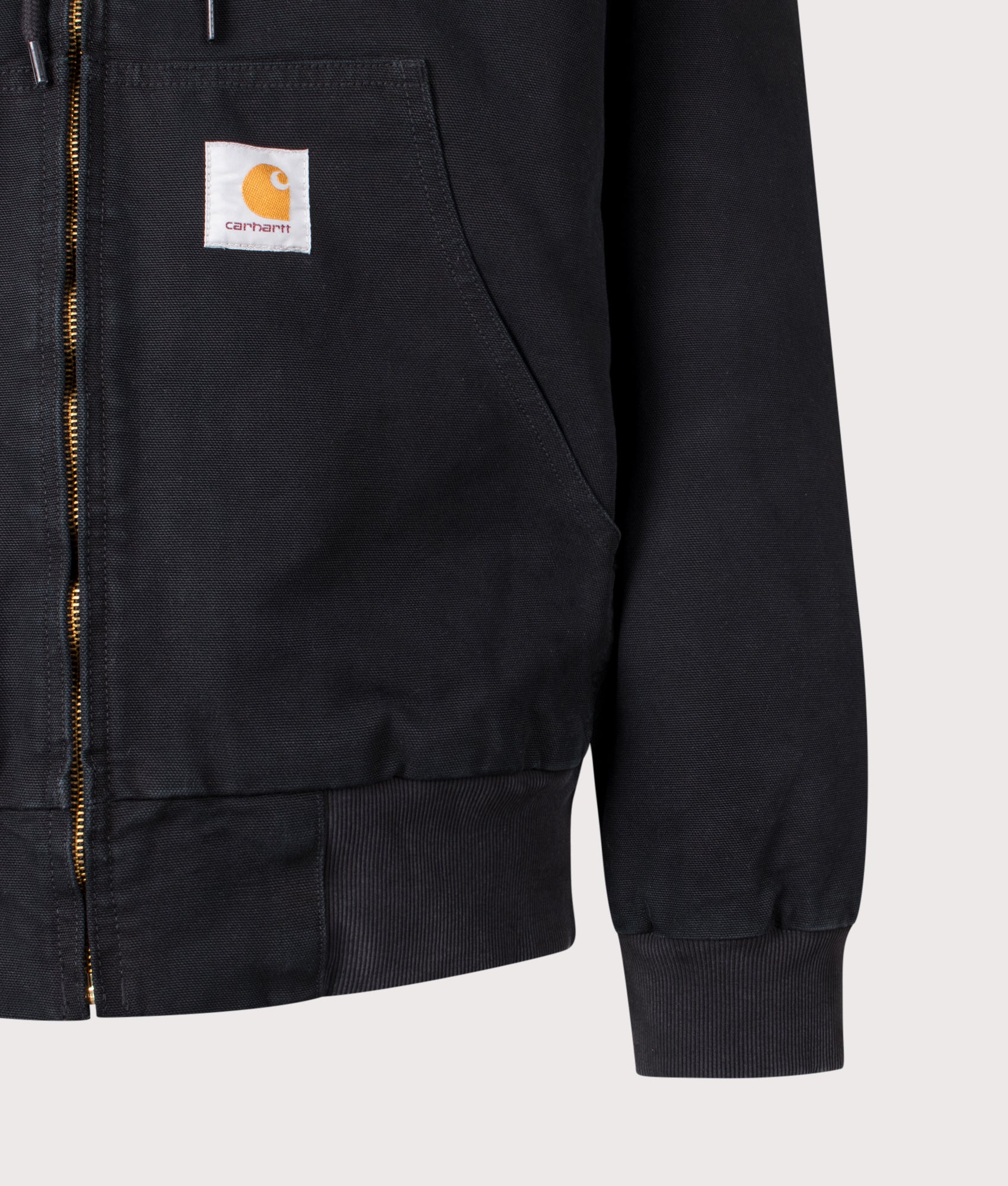 Carhartt WIP Loose Fit OG Active Jacket in Black Stone Canvas at EQVVS Menswear. Detail shot.