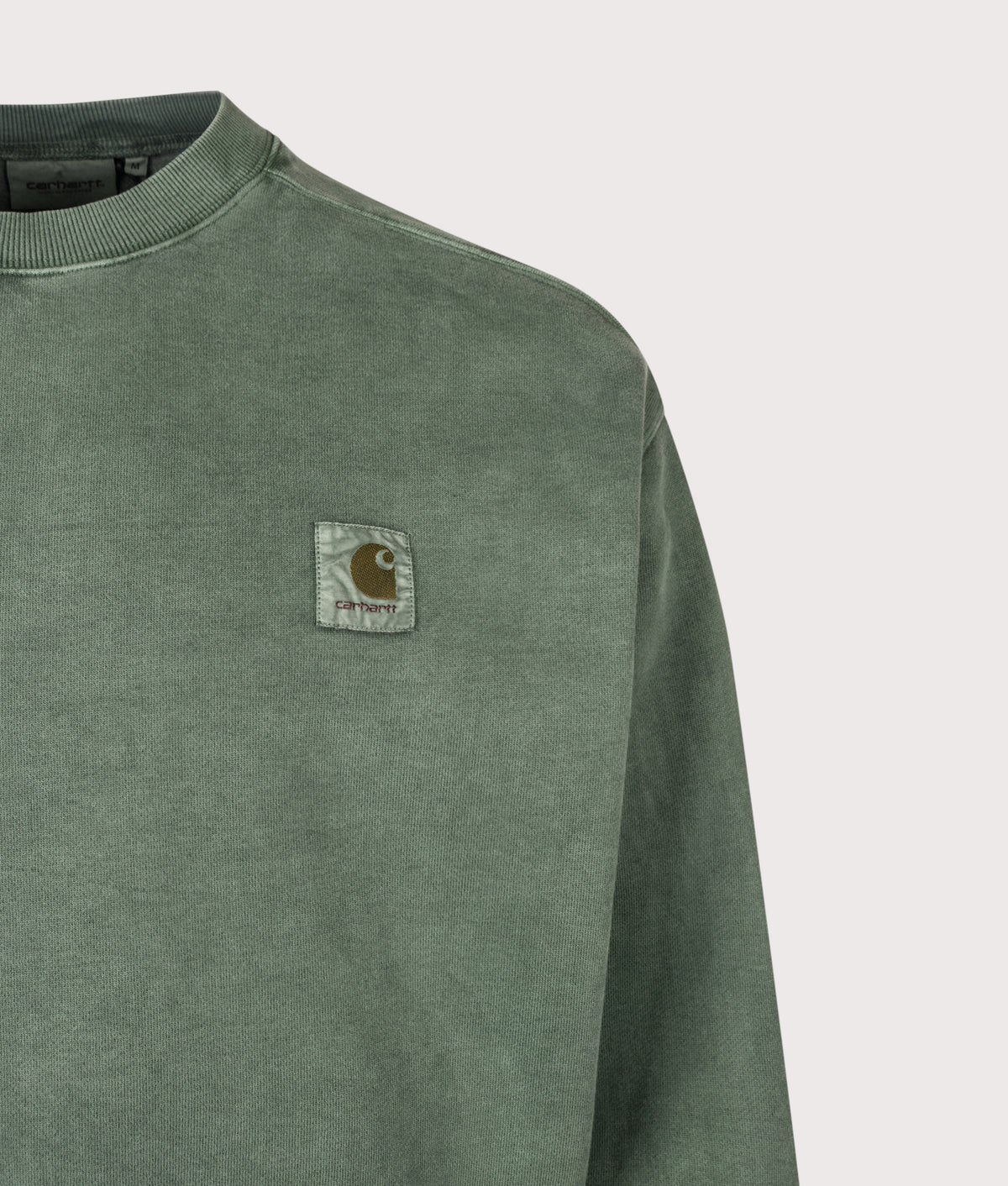 Carhartt WIP Balloon Fit Vista Sweatshirt in Dark Scarab at EQVVS Menswear. Detail shot.