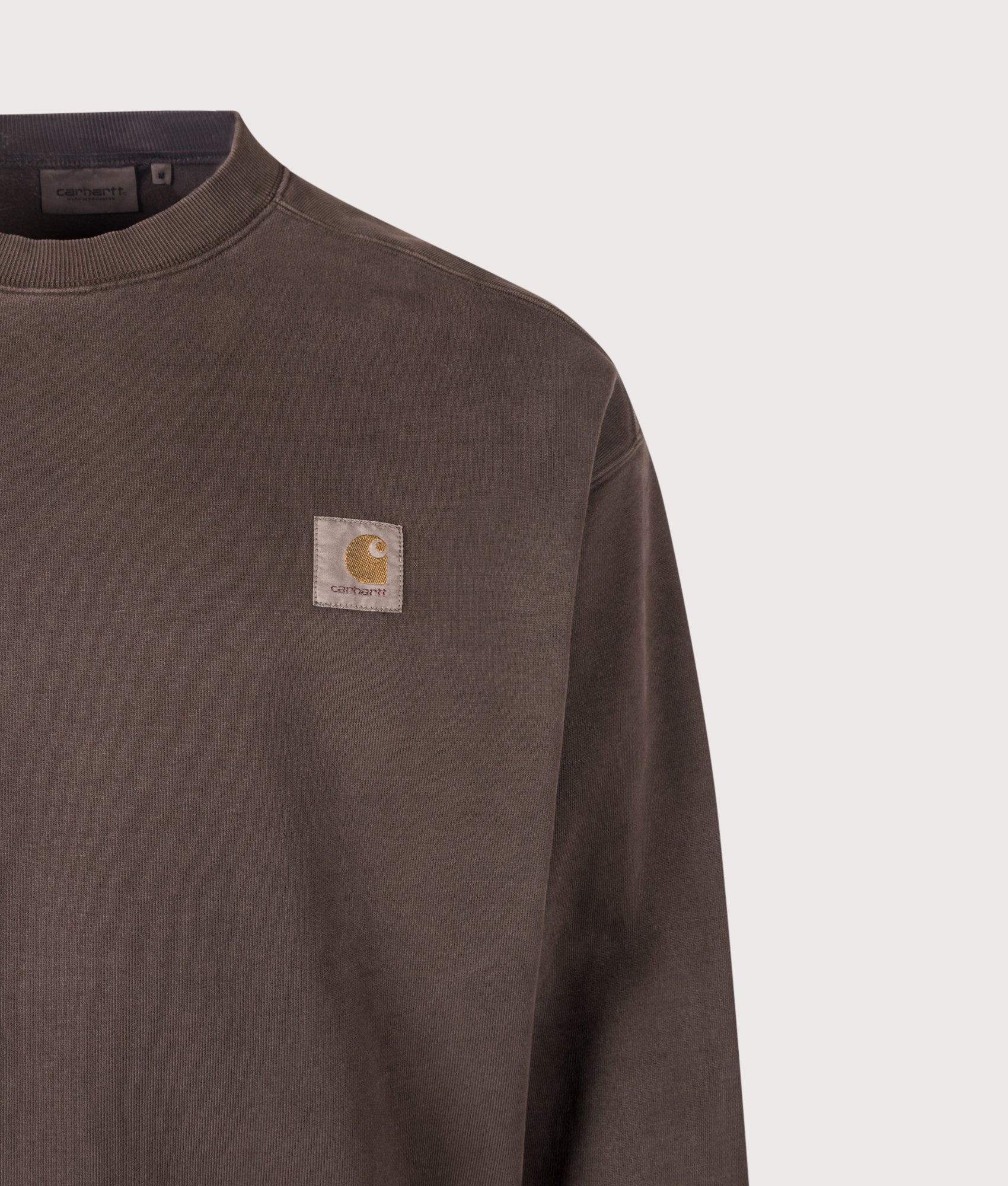 Carhartt WIP Balloon Fit Vista Sweatshirt in Tobacco at EQVVS Menswear. Detail shot.