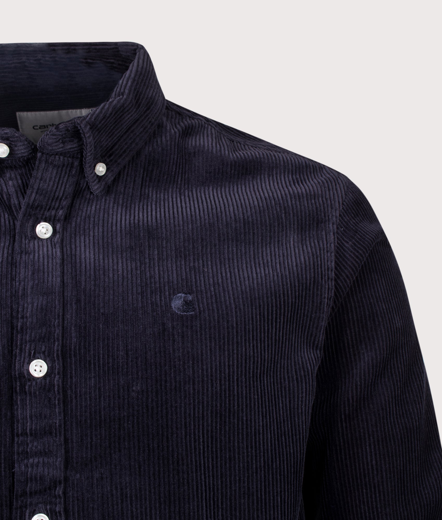 Carhartt WIP Regular Fit Madison Cord Shirt in Dark Navy at EQVVS Menswear. Detail shot.