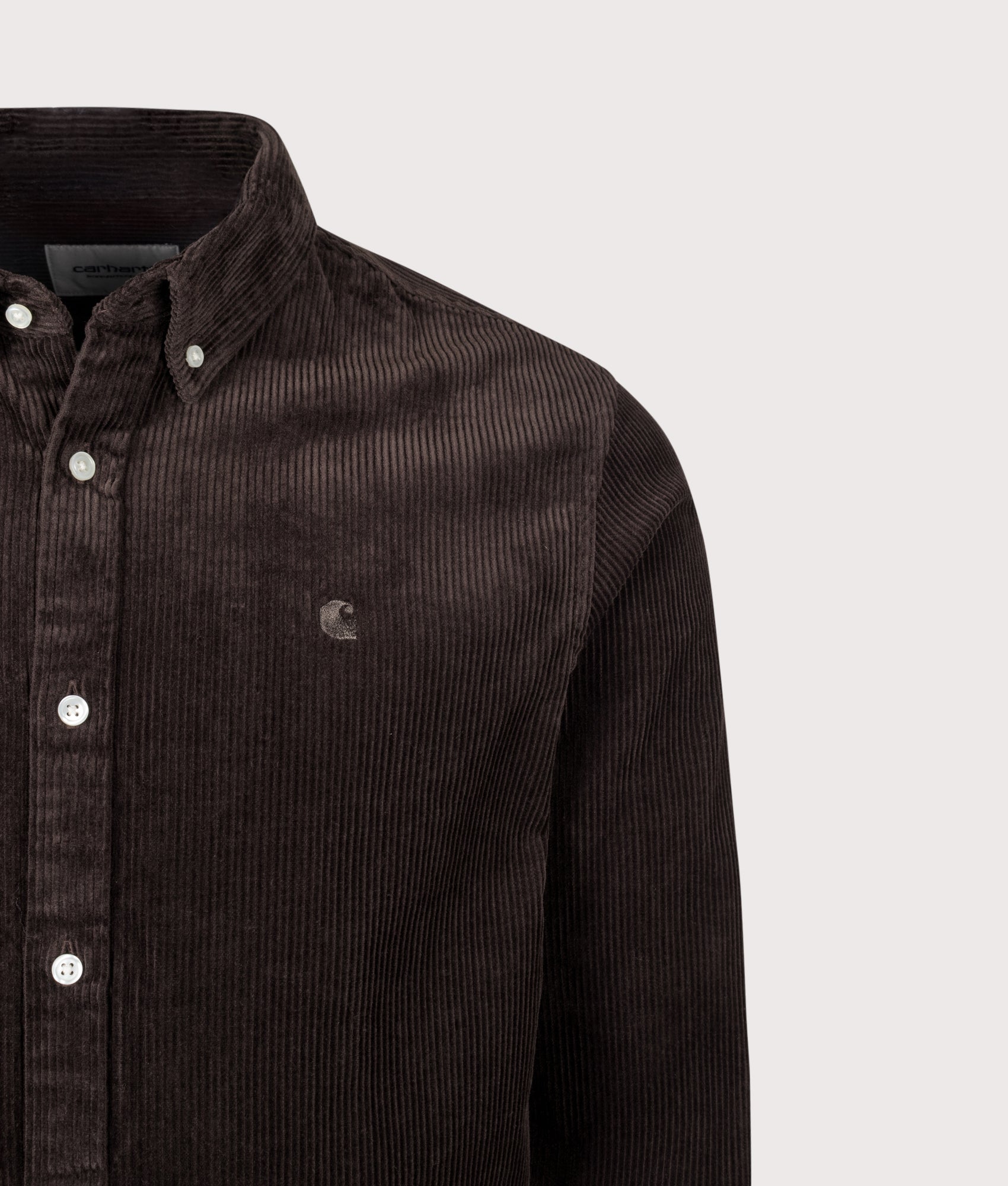 Carhartt WIP Regular Fit Madison Cord Shirt in Tobacco at EQVVS Menswear. Detail shot.