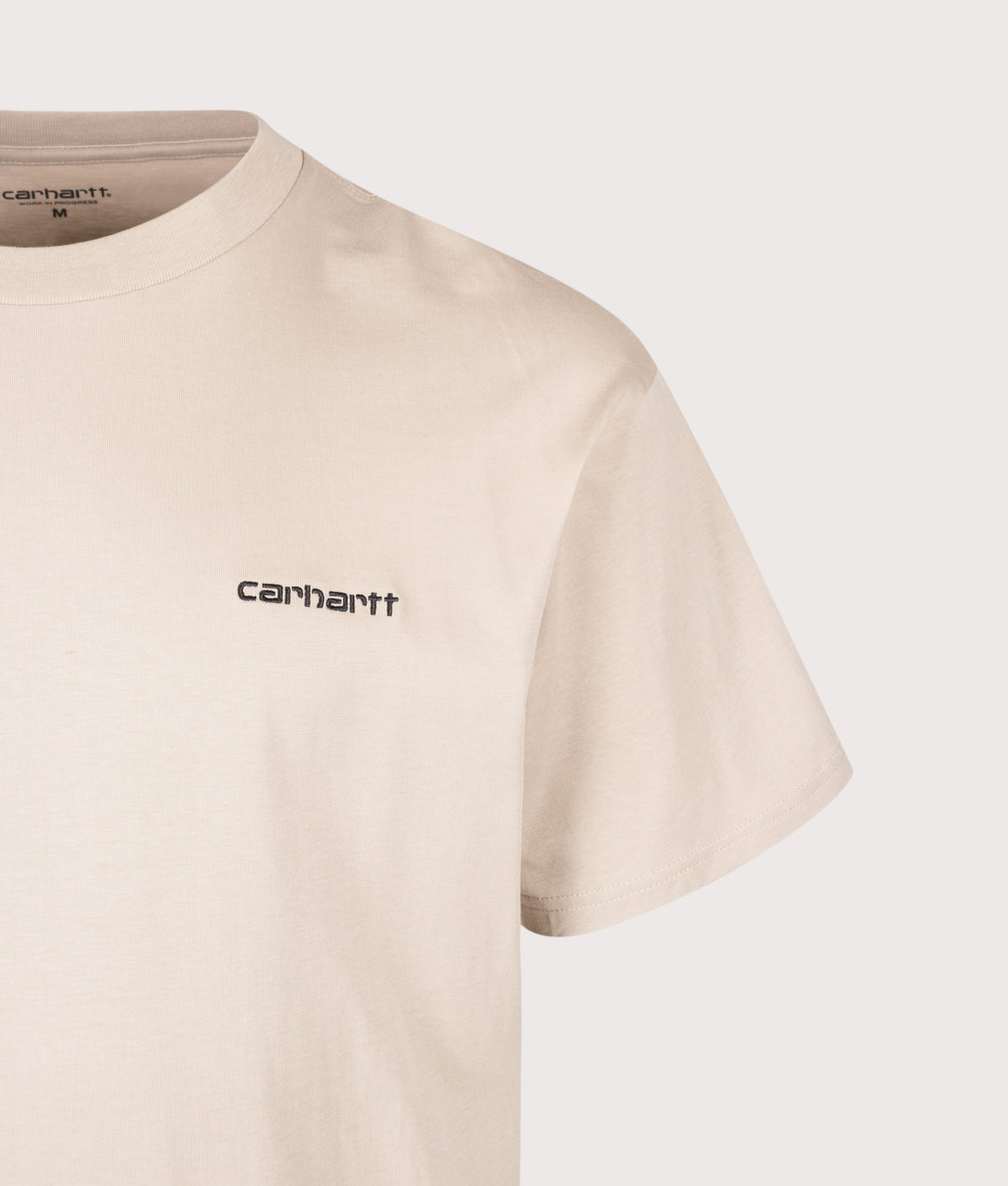 Carhartt WIP Loose Fit Script Embroidery T-Shirt in Fleur De Sel and Black at EQVVS Menswear. Detail shot.