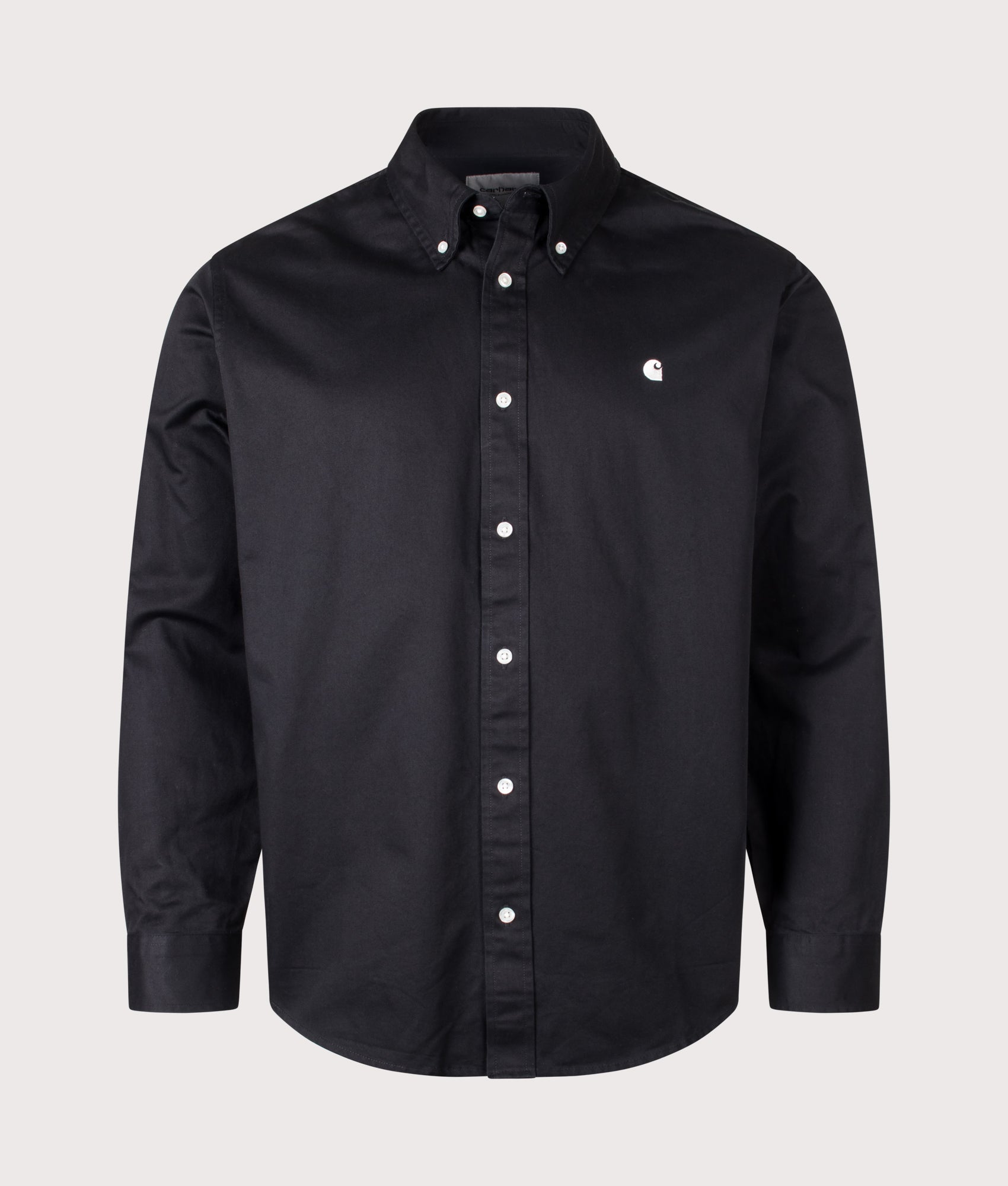 Carhartt WIP Loose Fit OG Madison Shirt in Black at EQVVS Menswear. Front shot.