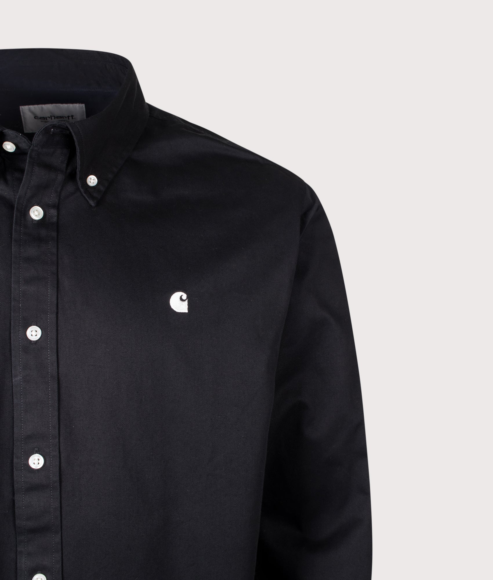 Carhartt WIP Loose Fit OG Madison Shirt in Black at EQVVS Menswear. Detail shot.