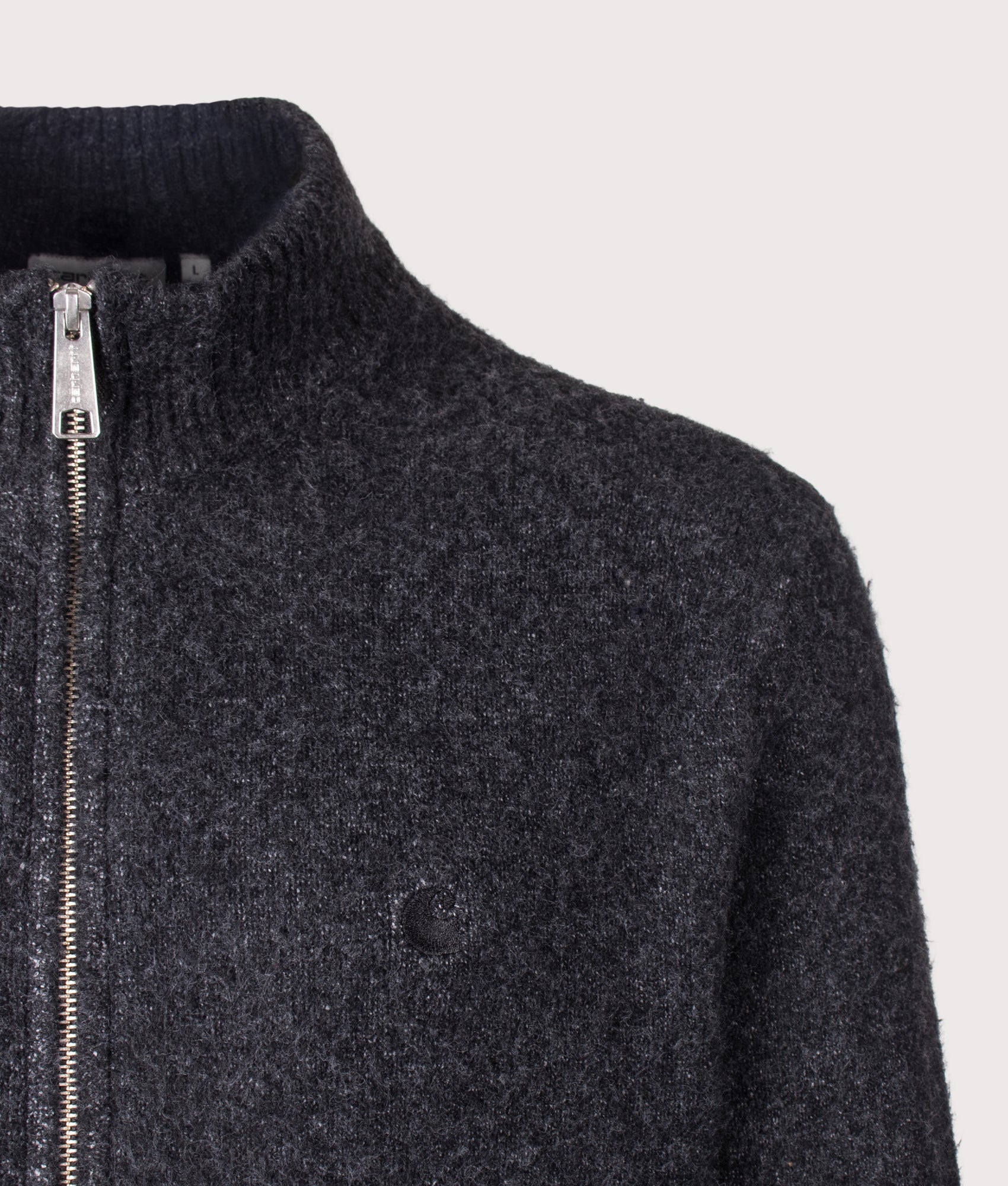 Carhartt WIP Regular Fit Curtis Knitted Jacket in Tangled Black at EQVVS Menswear. Detail shot.