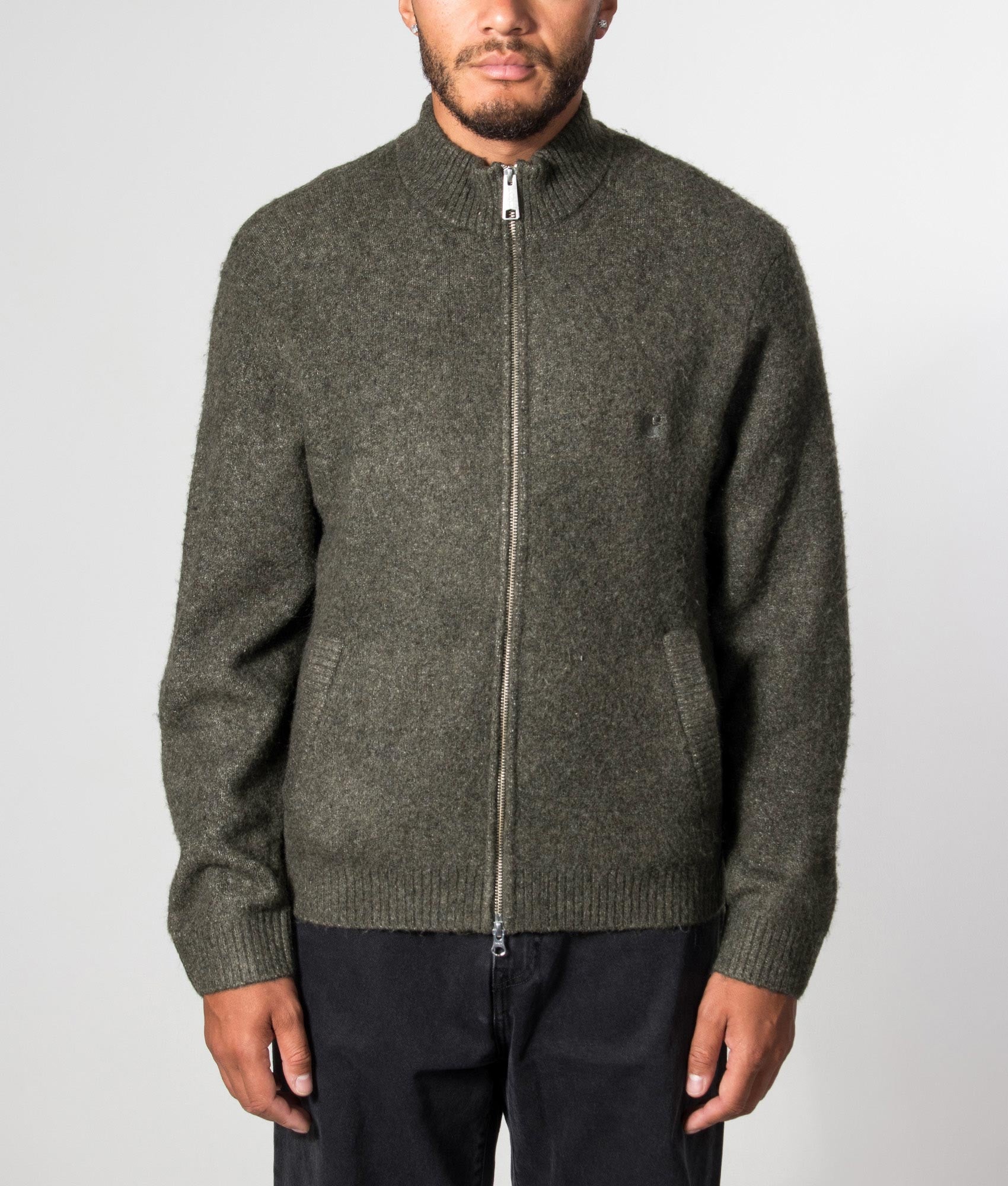 Carhartt WIP Regular Fit Curtis Knitted Jacket in Tangled Shungite at EQVVS Menswear. Model front shot.