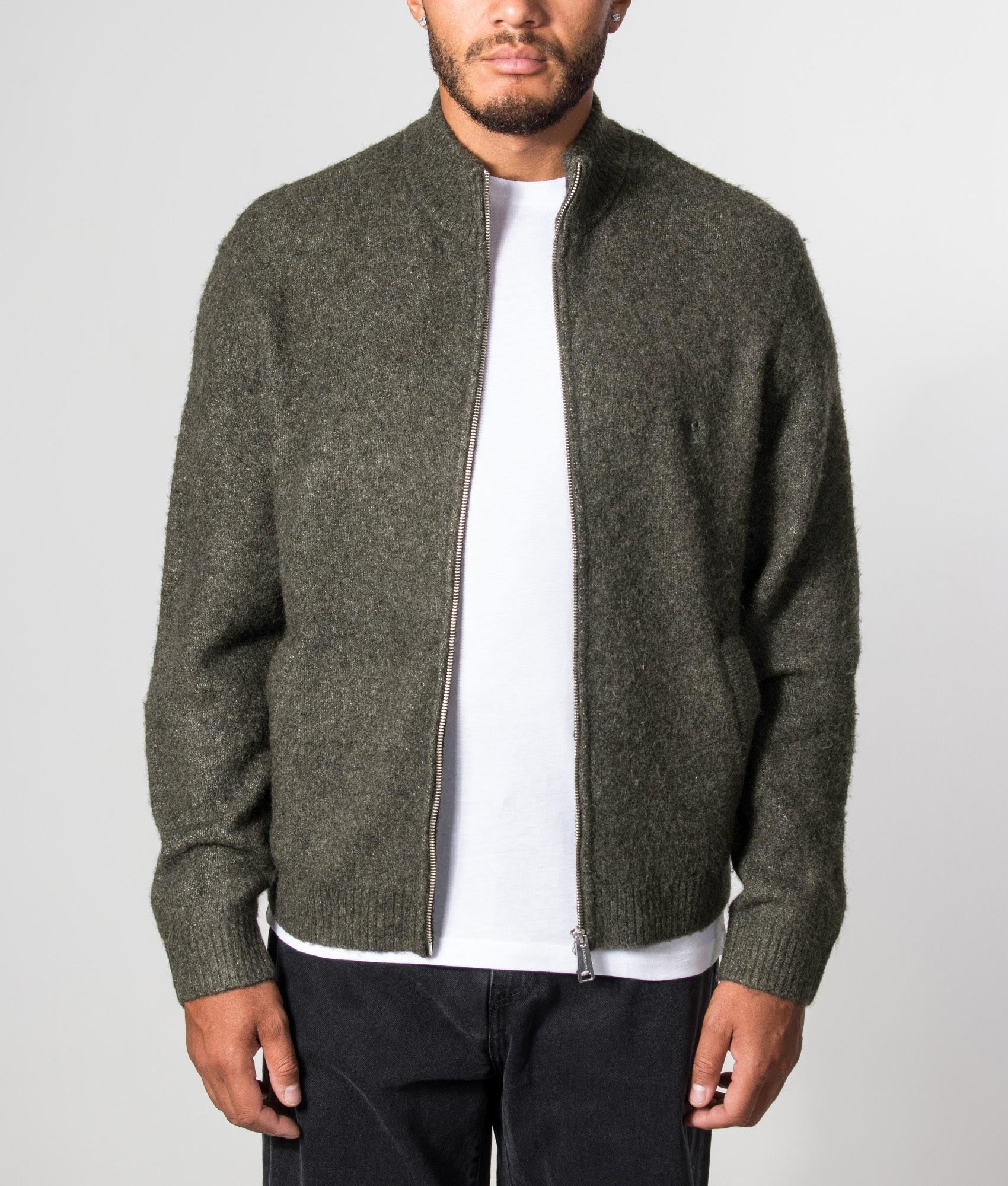 Carhartt WIP Regular Fit Curtis Knitted Jacket in Tangled Shungite at EQVVS Menswear. Model front shot.