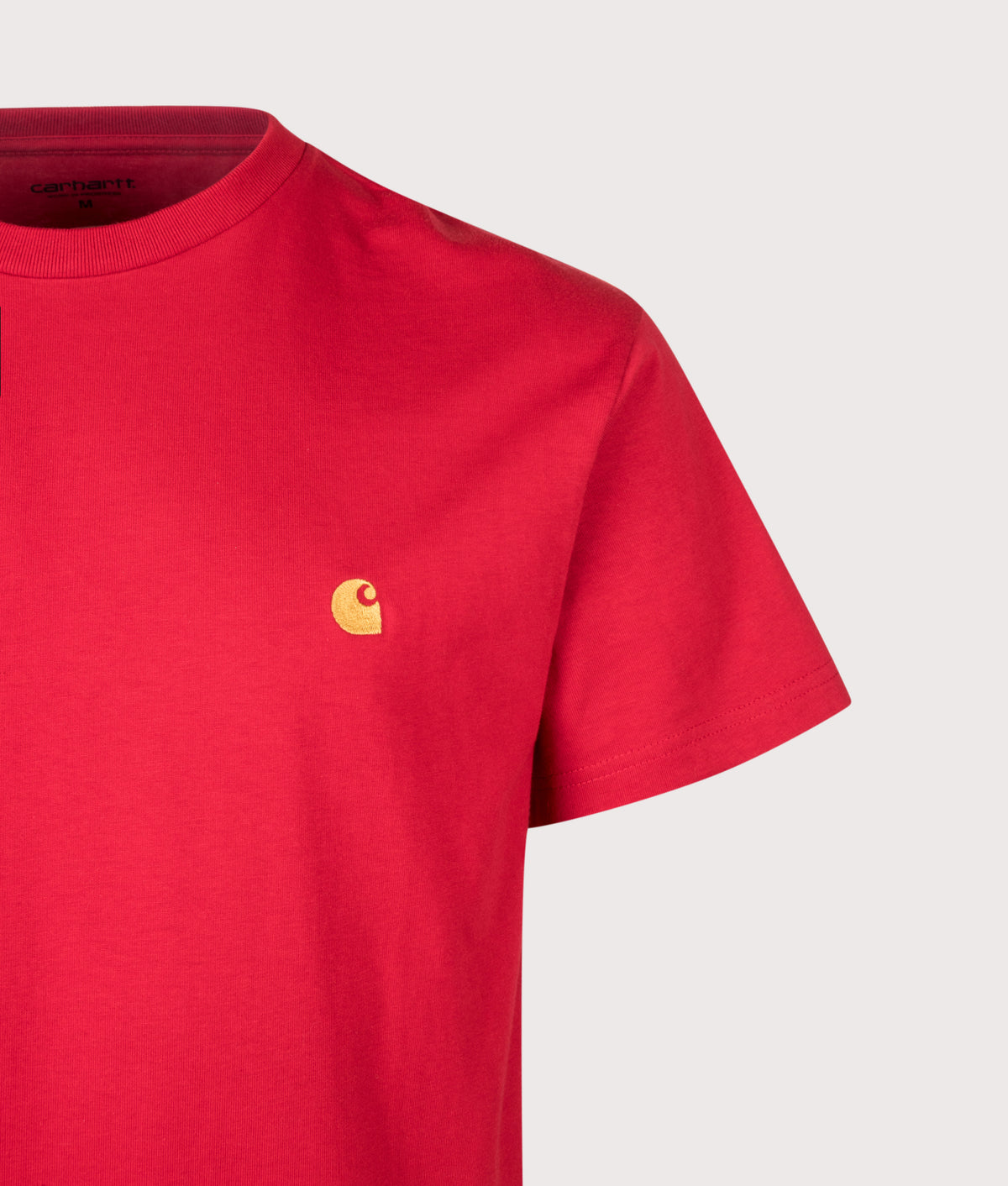 Carhartt WIP Loose Fit Chase T-Shirt in Chilli Pepper and Gold at EQVVS Menswear. Detail shot.