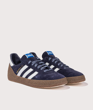 Montreal 76 Trainers in Shadow Navy/Halo Blue/Gum 5 | adidas Originals | Shot at EQVVS | Front angle shot 