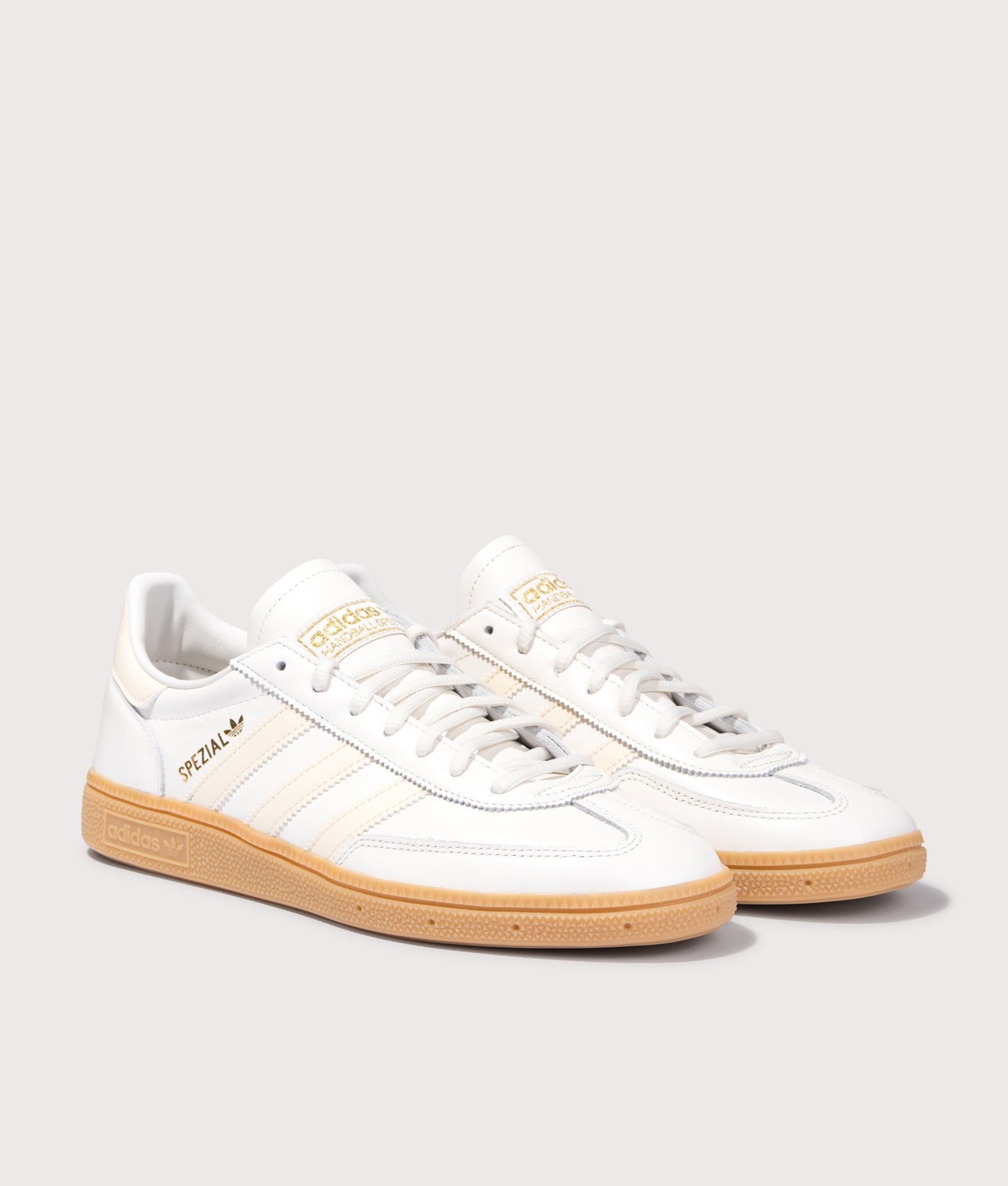 Handball Spezial Trainers in Core White/Wonder White/Gum3 | adidas Originals | Shot at EQVVS | Front angle shot 