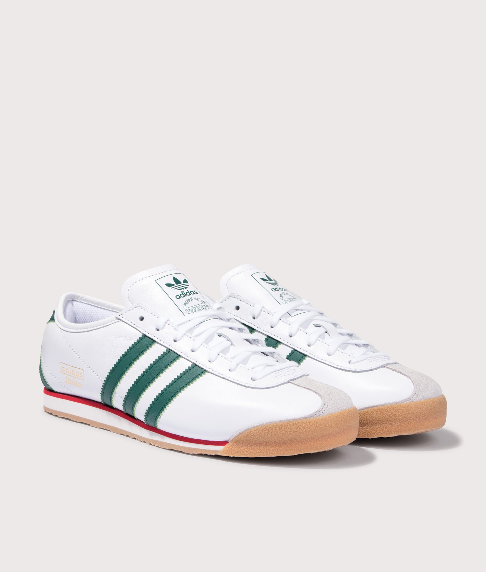 adidas Original Italia 70s Trainers in Cloud White, Collegiate Green and Gum 3 at EQVVS Menswear. Angled front shot.