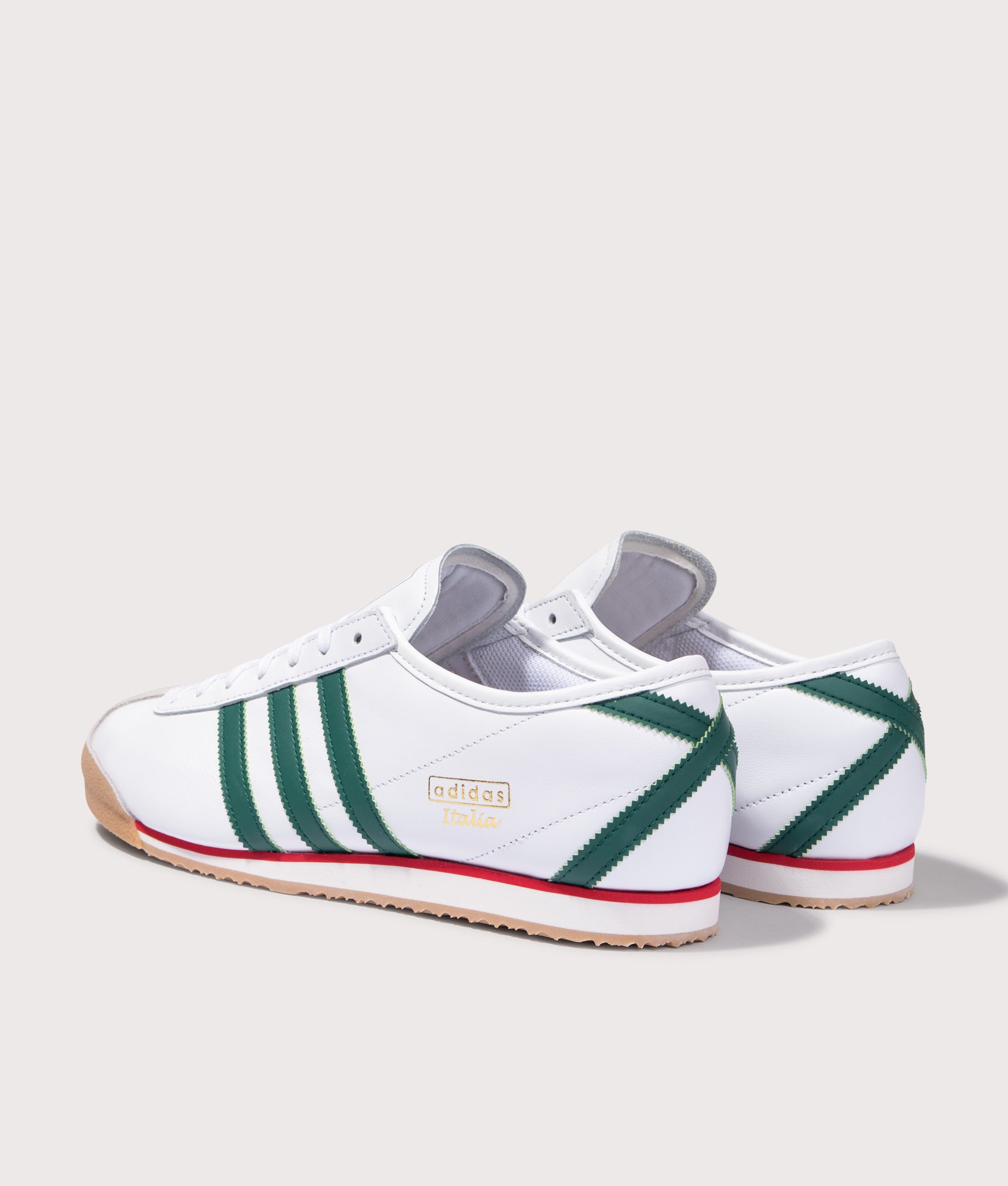 adidas Original Italia 70s Trainers in Cloud White, Collegiate Green and Gum 3 at EQVVS Menswear. Angled back shot.