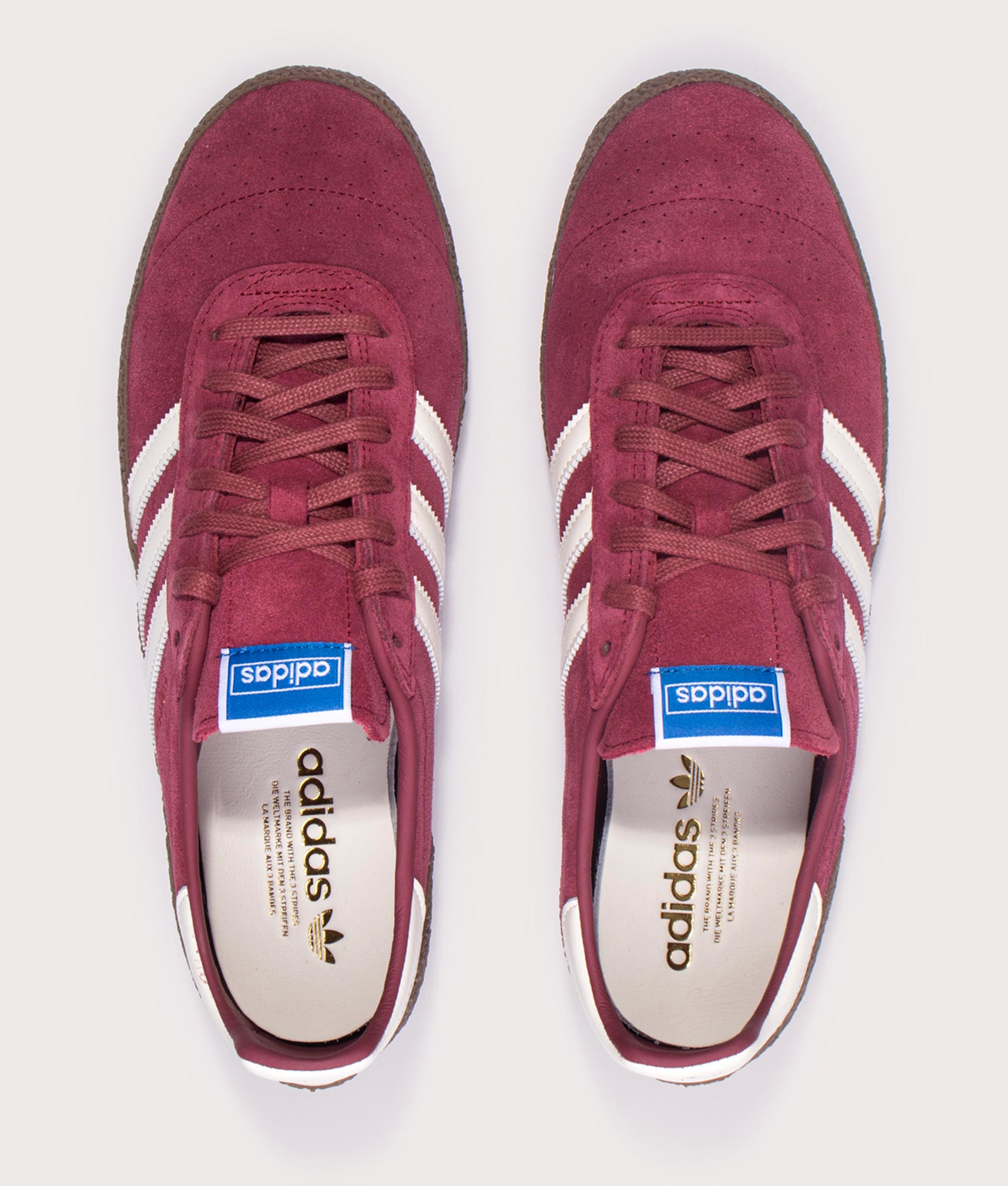 Adidas Montreal 76 Trainers in Noble Maroon/Off White/Gum at EQVVS Menswear. Above shot. 