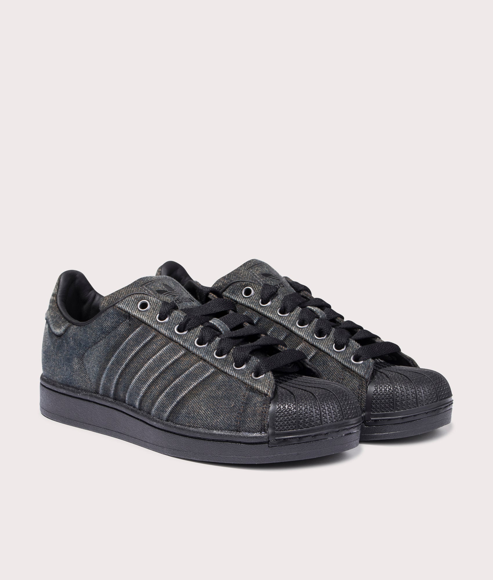adidas Originals Superstar II Trainers in Black at EQVVS Menswear. Angled front shot.