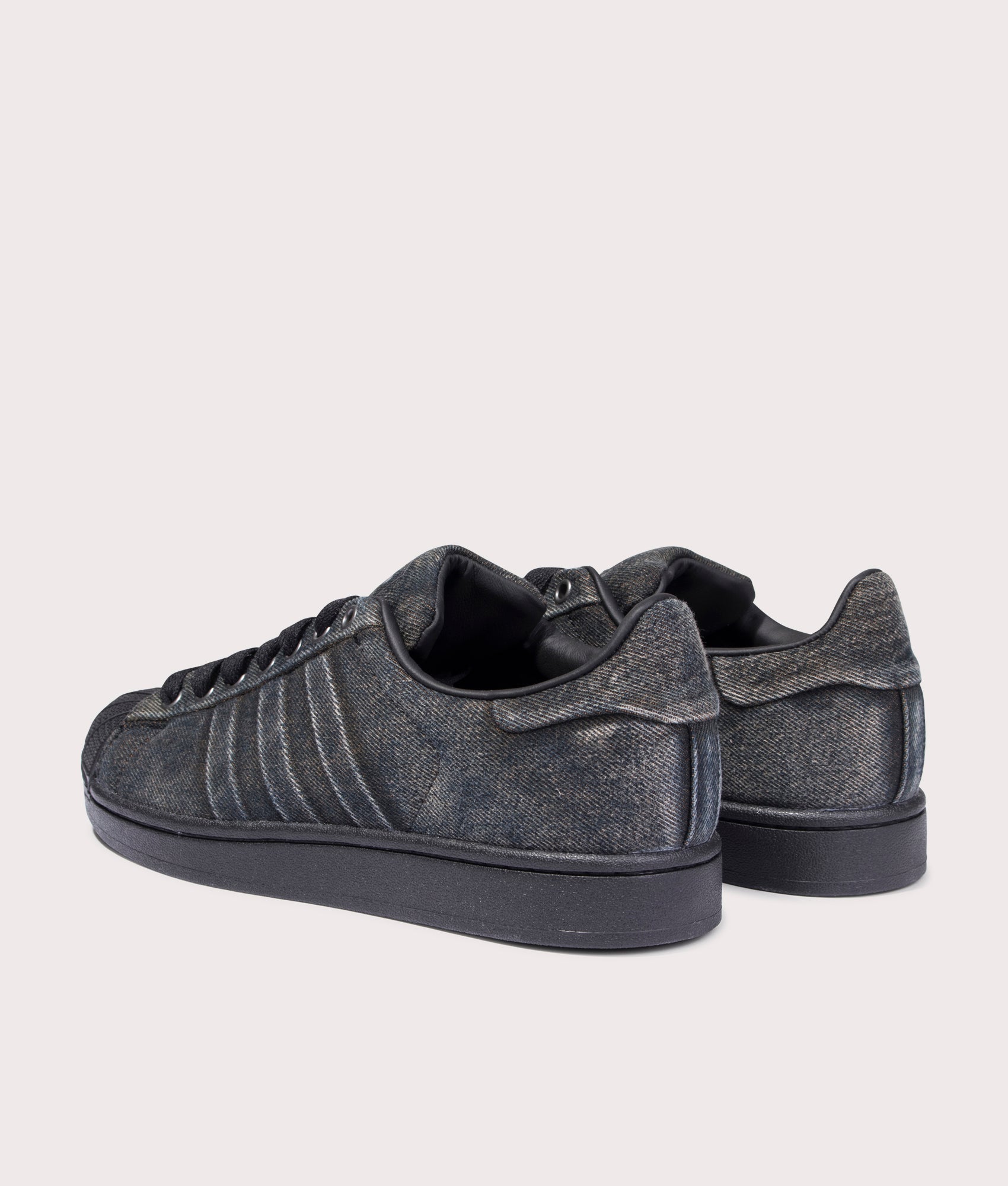 adidas Originals Superstar II Trainers in Black at EQVVS Menswear. Angled back shot.