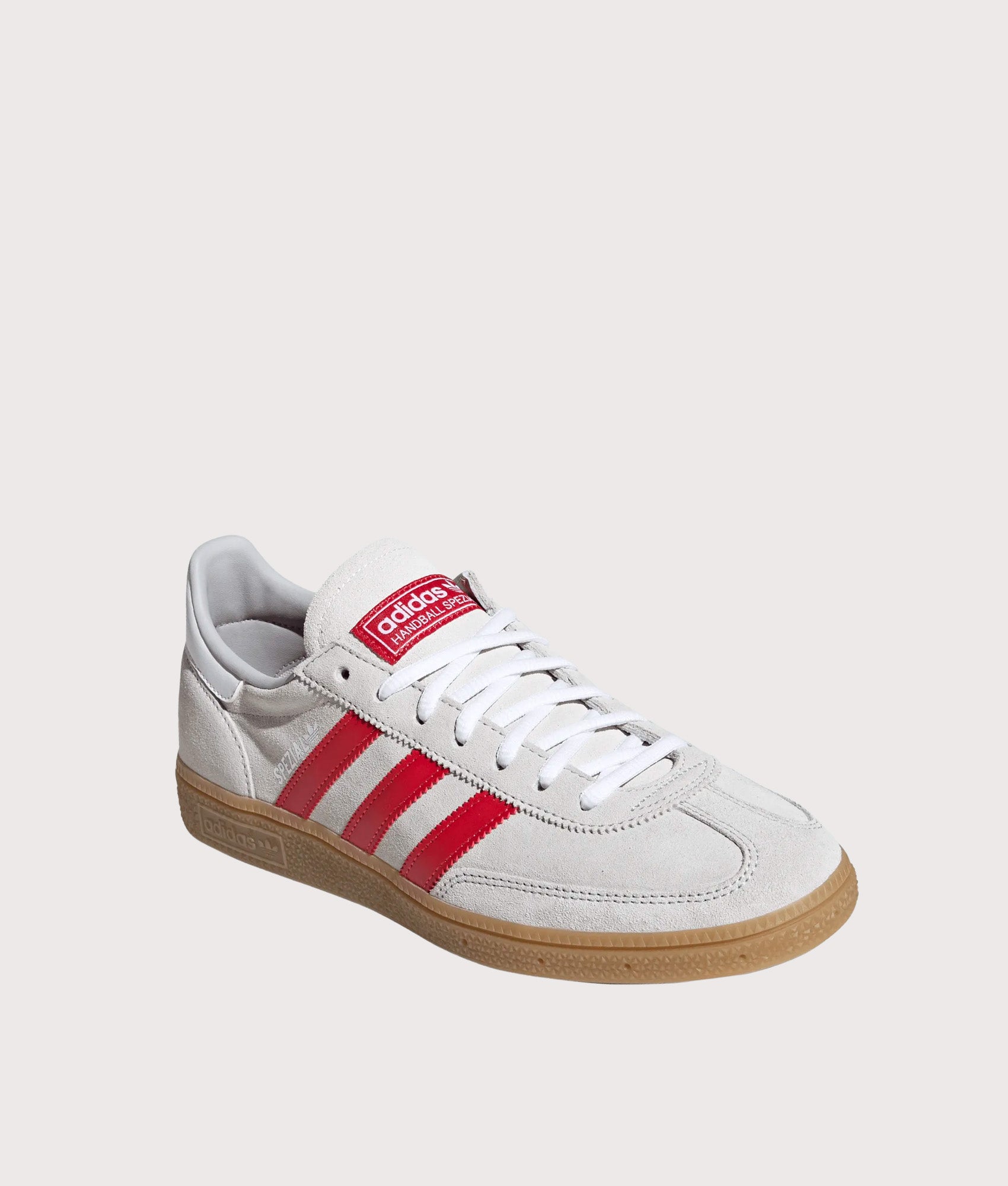 adidas Originals Liverpool FC Handball Spezial Trainers in Grey Two, Strawberry Red and Footwear White at EQVVS Menswear. Angled front shot.