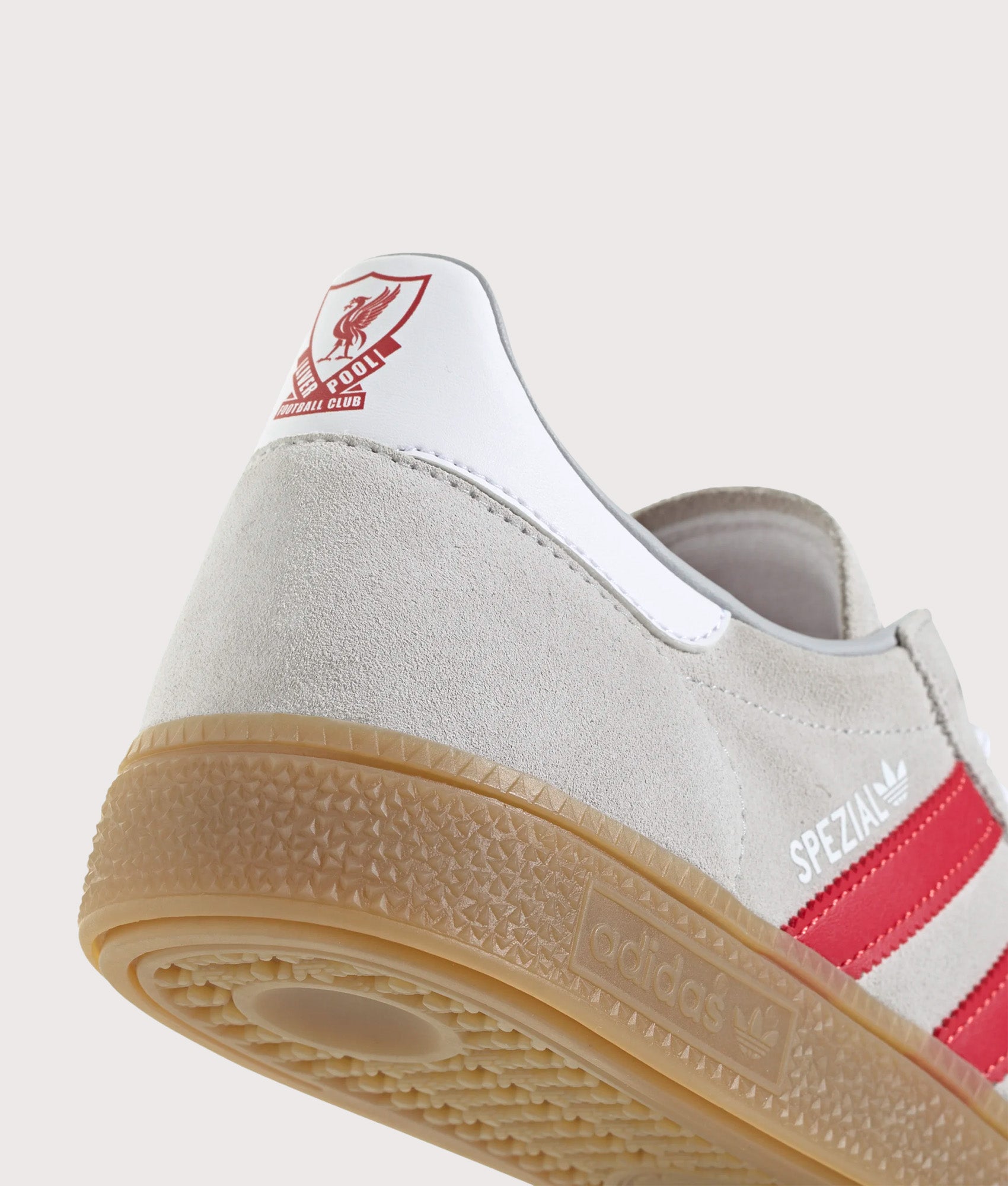 adidas Originals Liverpool FC Handball Spezial Trainers in Grey Two, Strawberry Red and Footwear White at EQVVS Menswear. Heel shot.