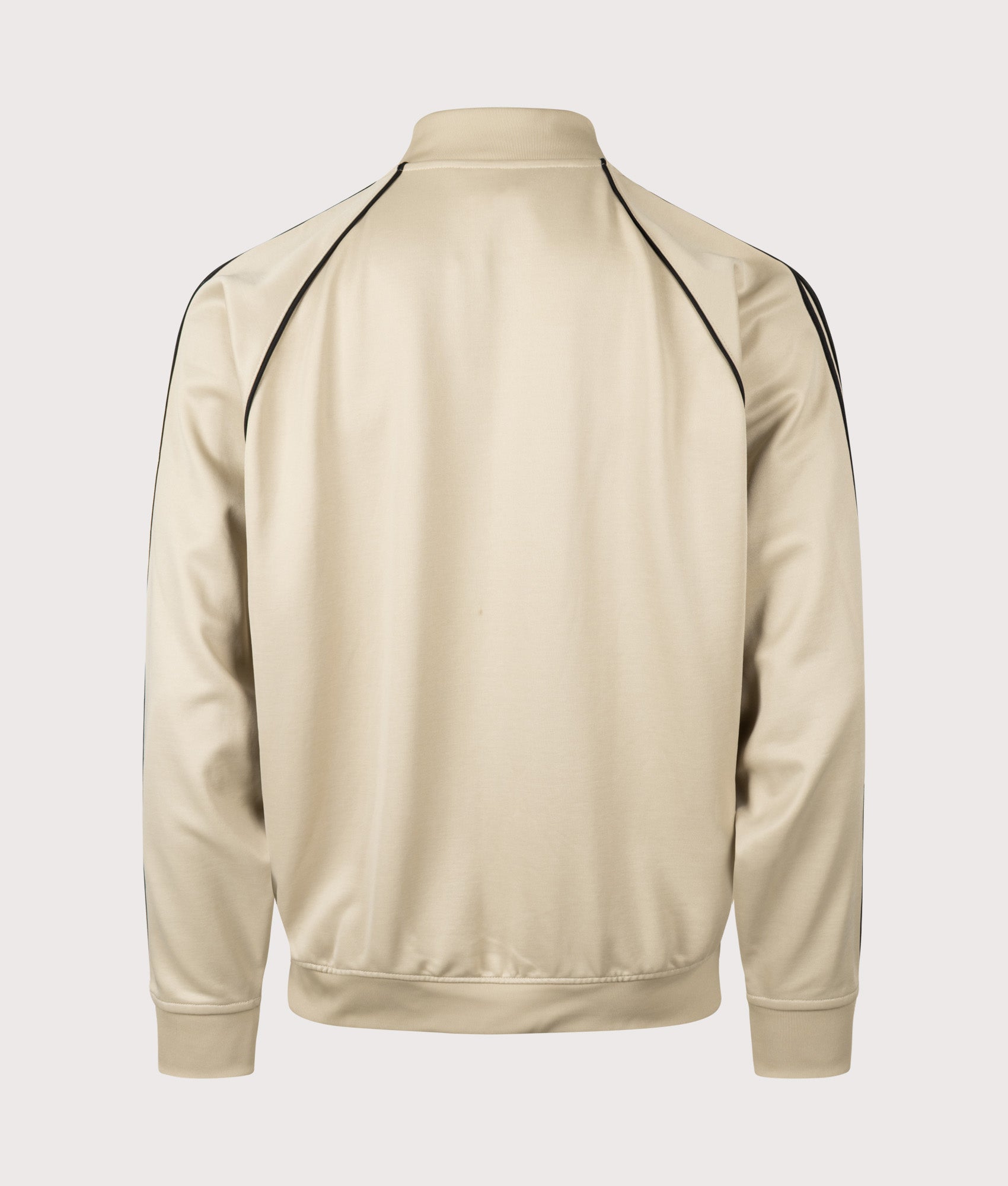 adidas Originals SST Track Top in Stone Khaki and Black at EQVVS Menswear. Back shot.