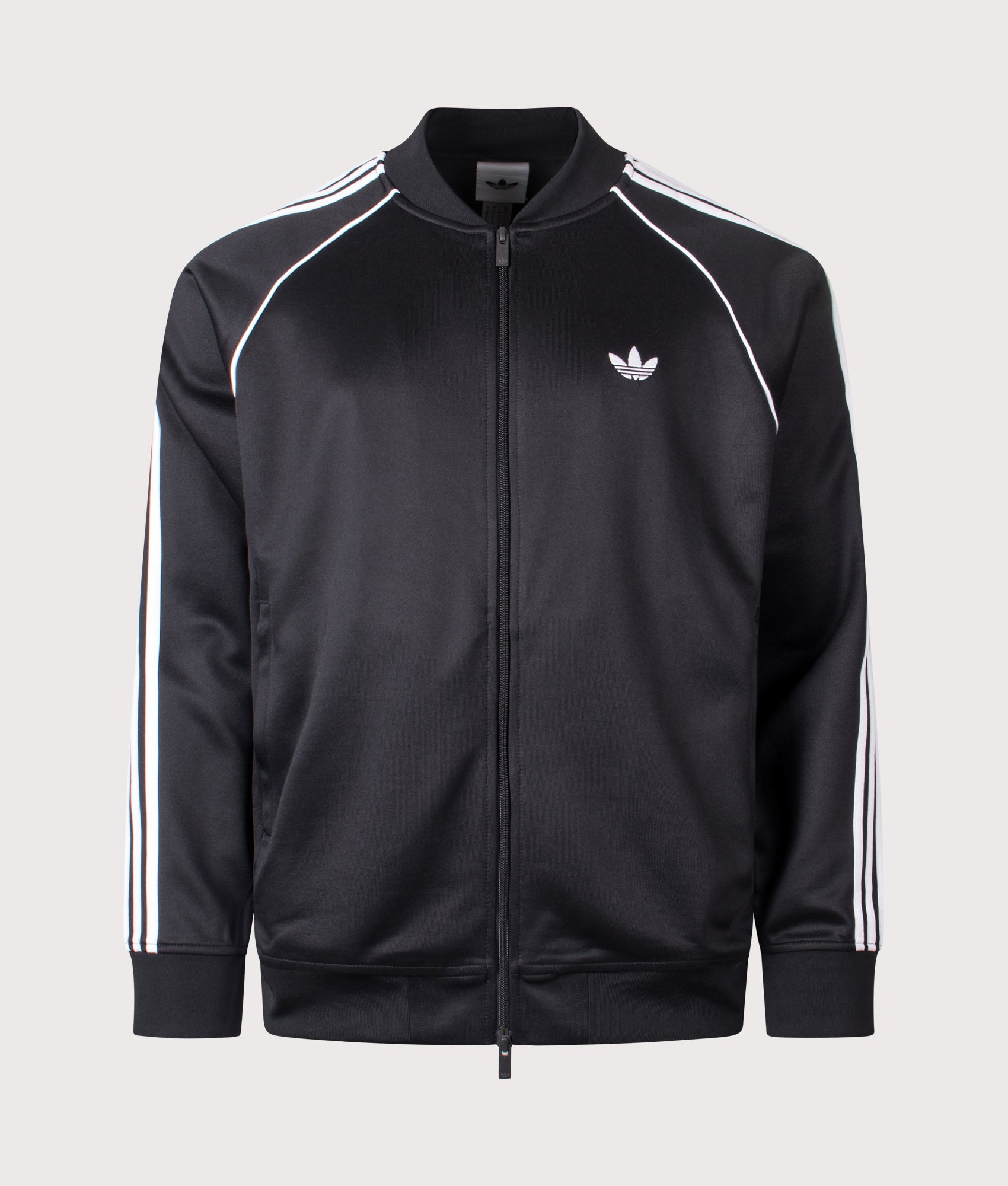adidas Originals SST Track Top in Black and White at EQVVS Menswear. Angled front shot. Front shot. 