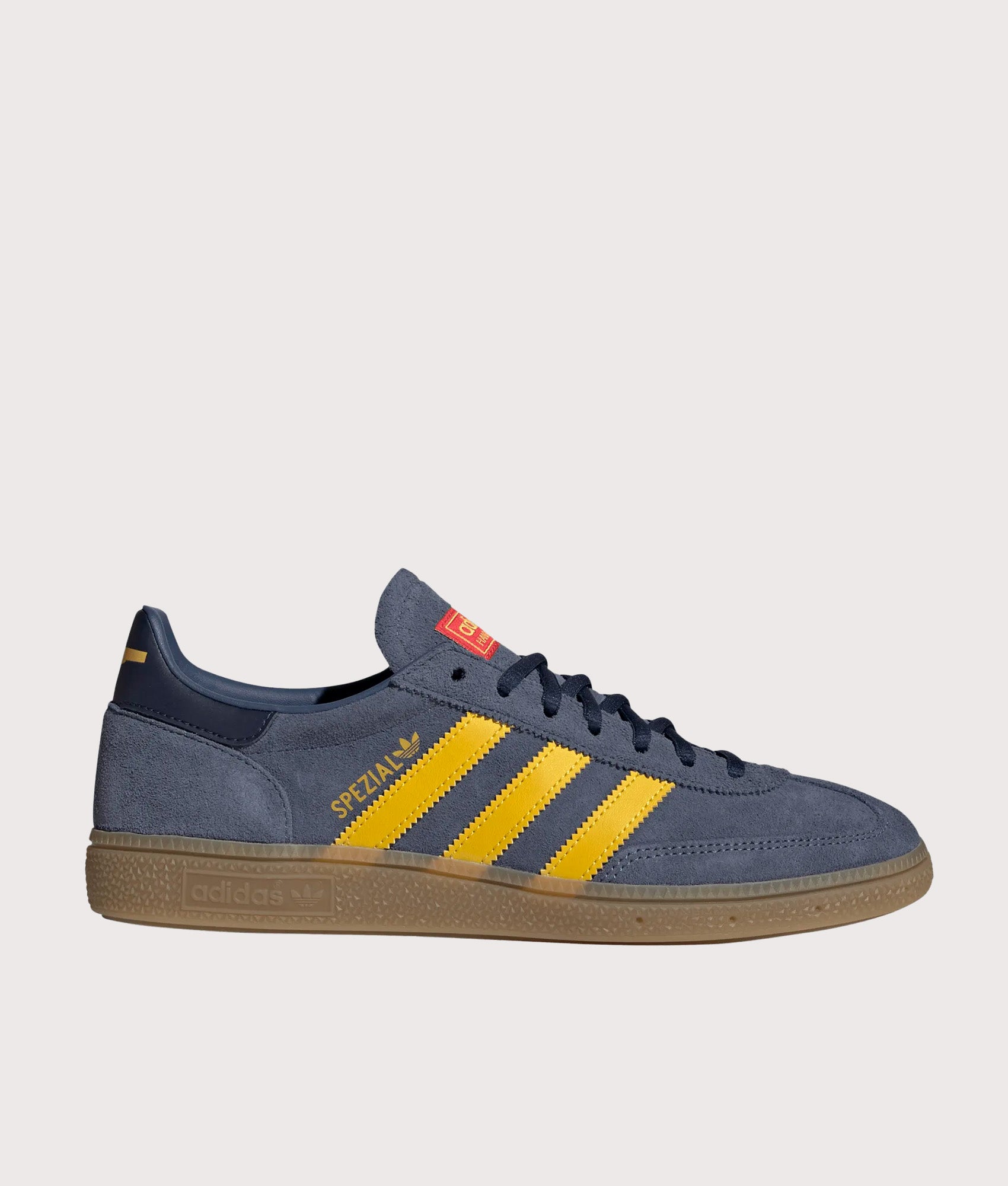 adidas Originals Arsenal FC Handball Spezial Trainers in Preloved Ink, Hazy yellow and Collegiate Navy at EQVVS Menswear. Side shot.