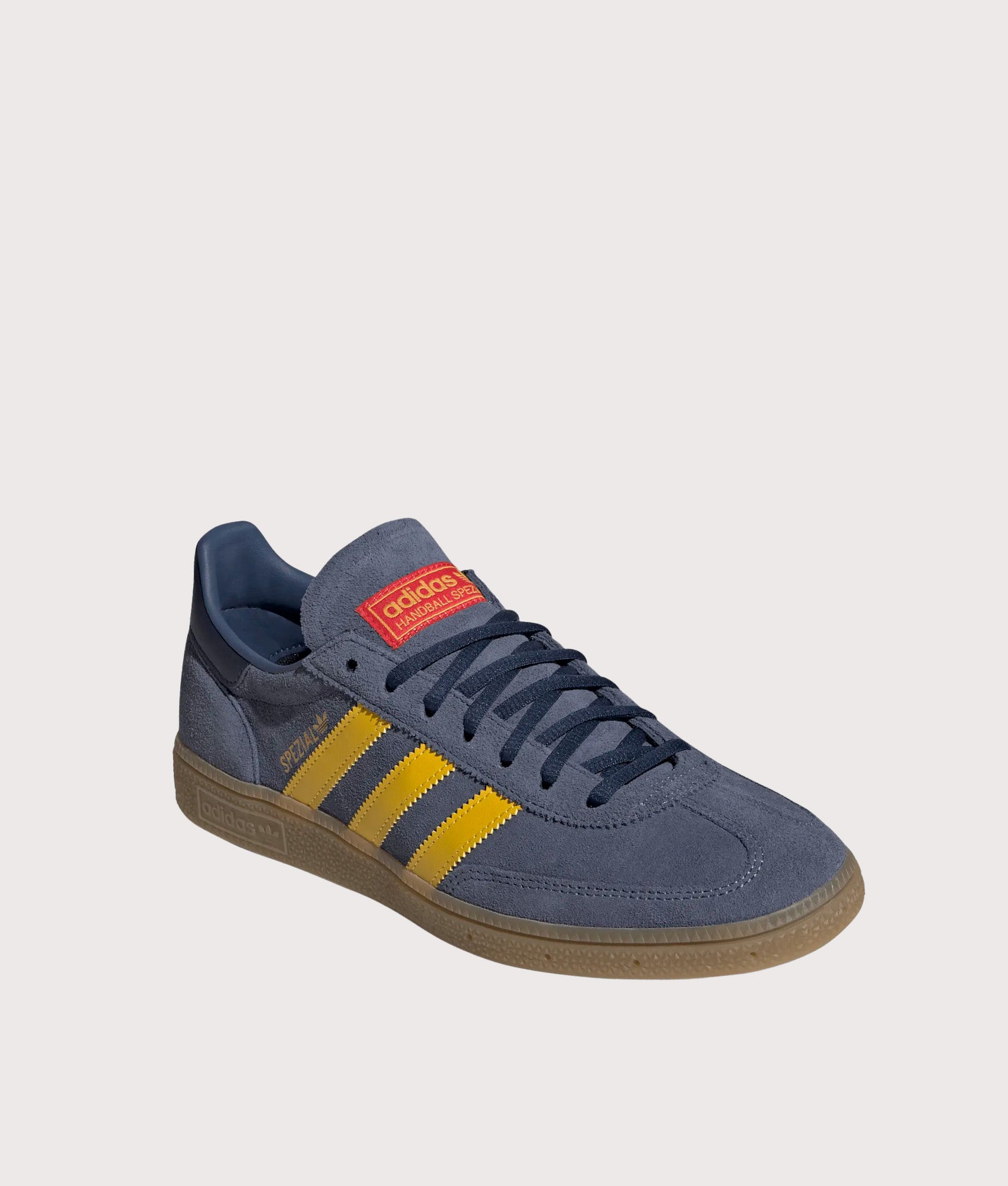 adidas Originals Arsenal FC Handball Spezial Trainers in Preloved Ink, Hazy yellow and Collegiate Navy at EQVVS Menswear. Angled front shot.